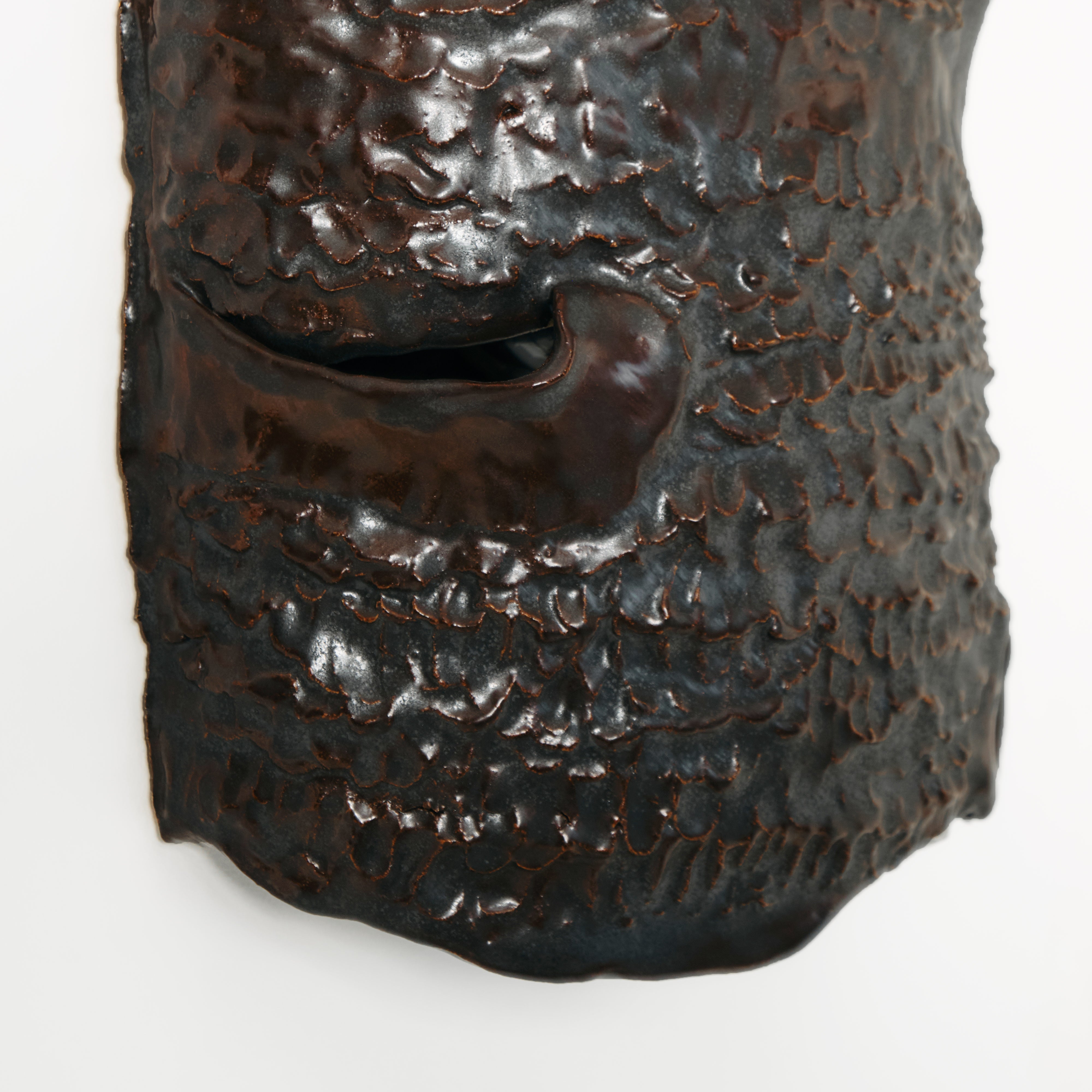 Casa Wall Light No3 — back view highlighting textured dark ceramic surface