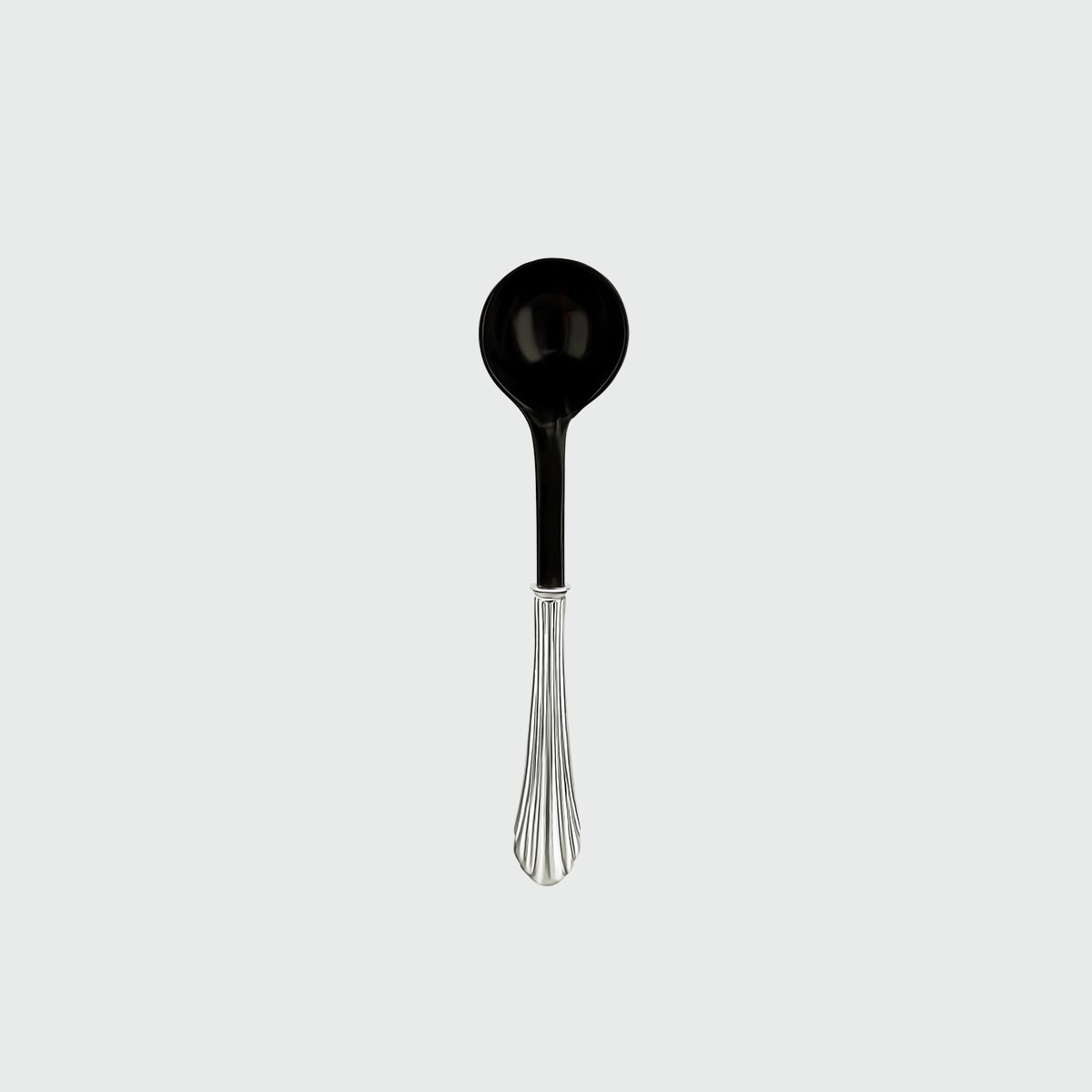 Ossu Black Spoon — top view highlighting black ceramic bowl and silver handle