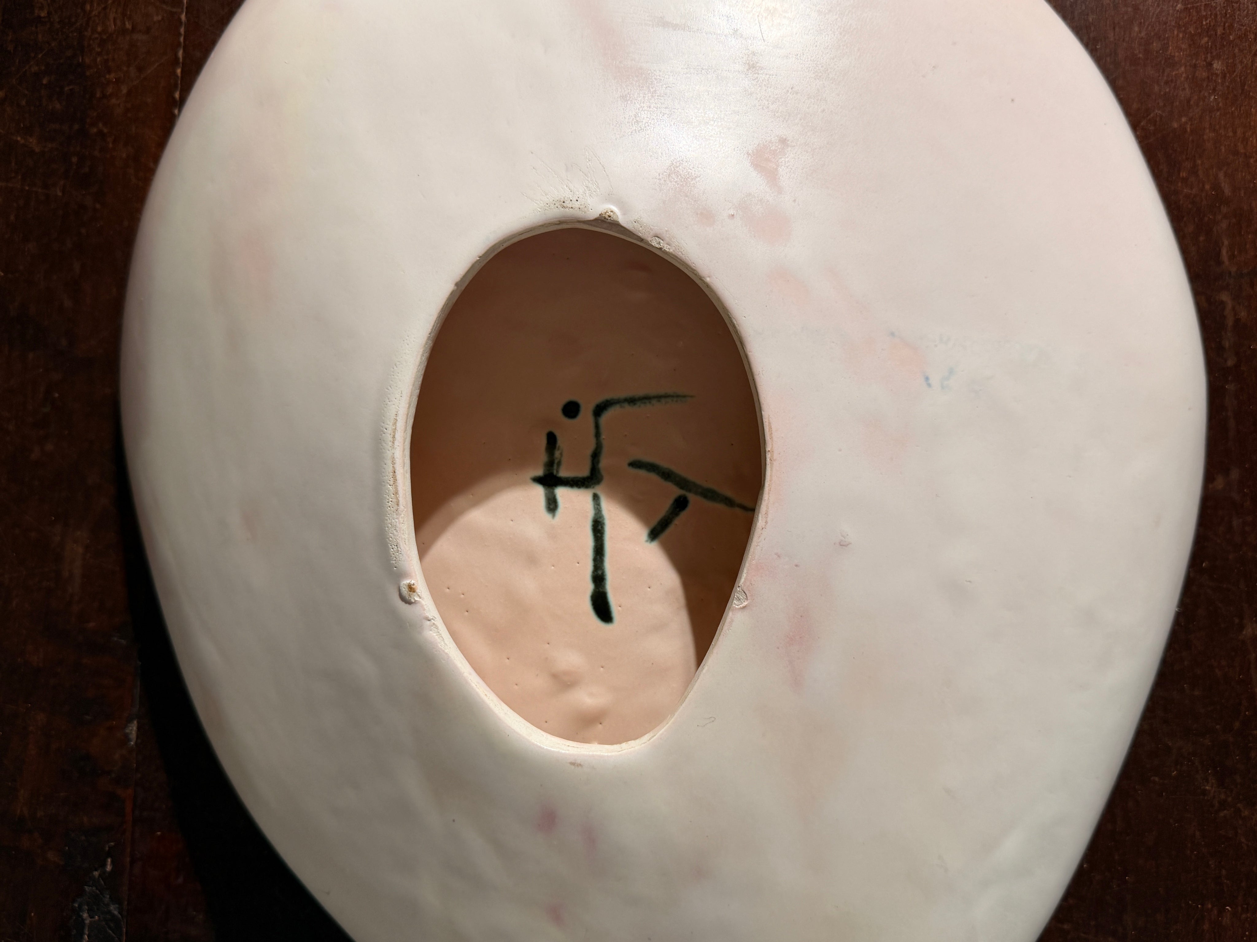 Large free-form dish in white ceramic, France, circa 1950 — lifestyle setting