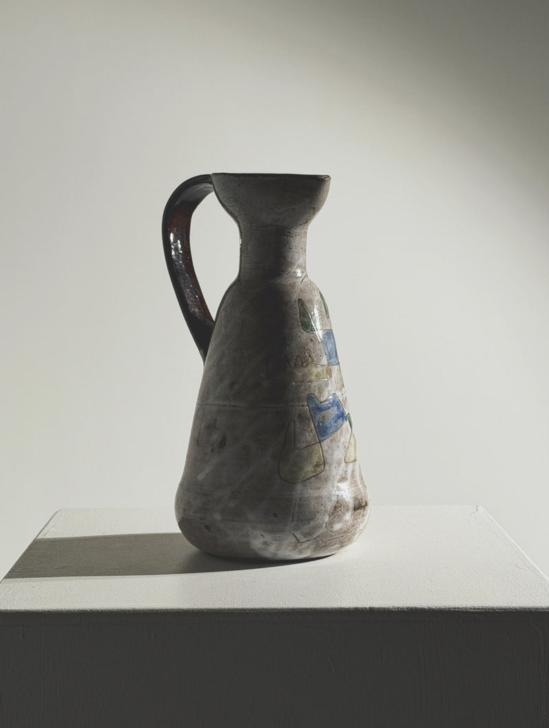 Ceramic pitcher by Jean Rivier, Vallauris, circa 1960 — side view highlighting earthy tones and handle