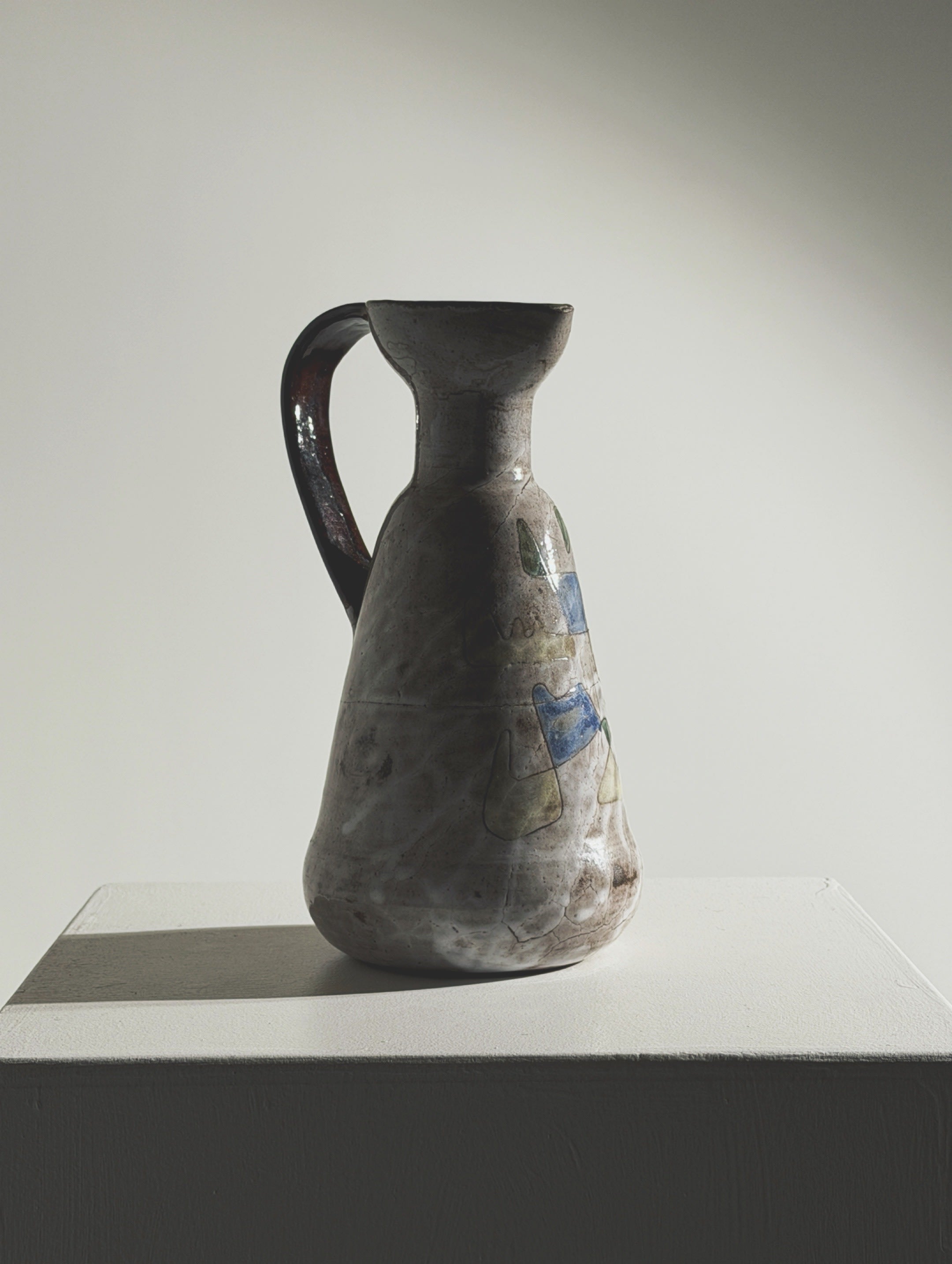Ceramic pitcher by Jean Rivier, Vallauris, circa 1960 — side view highlighting earthy tones and handle