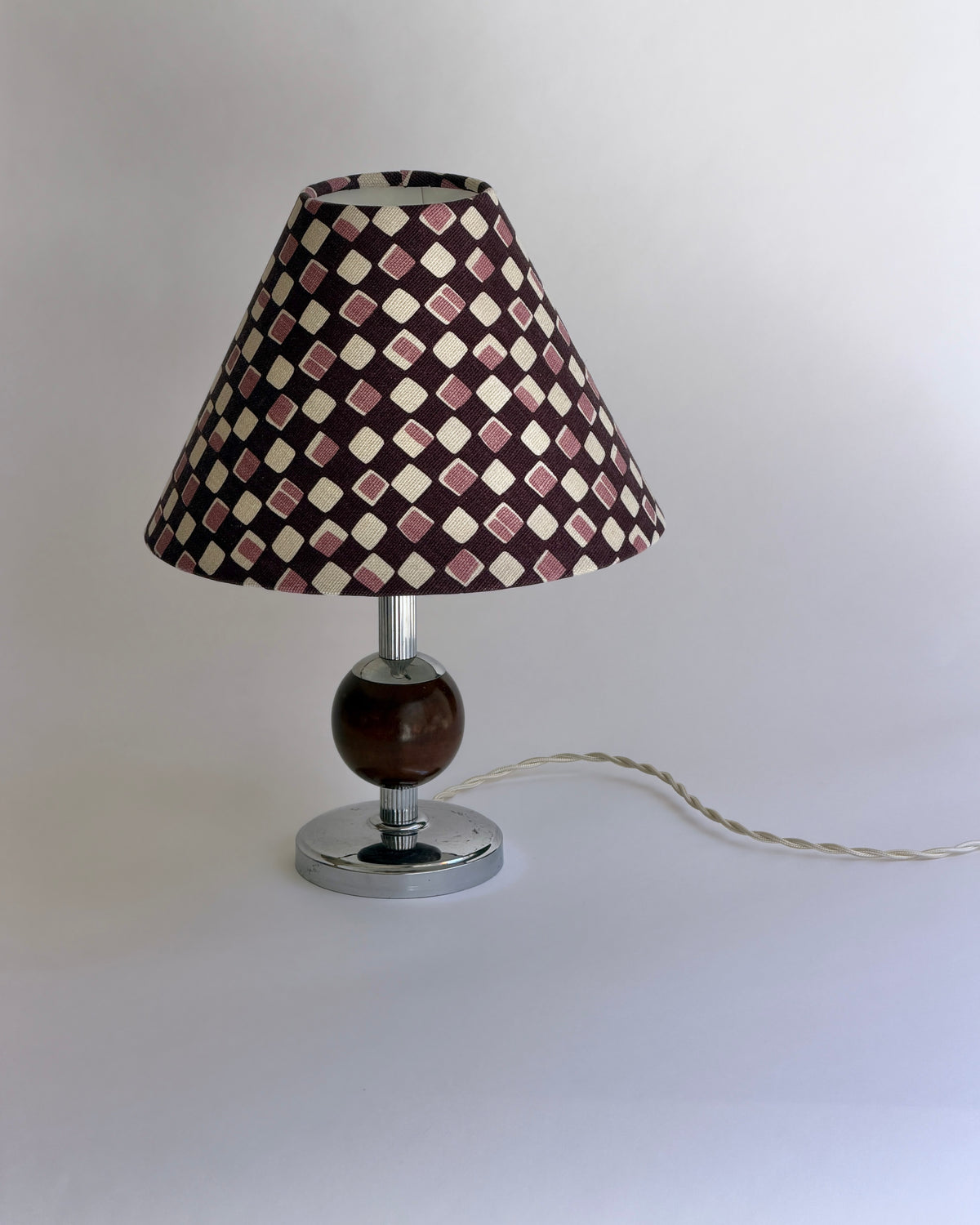 Swedish vintage Art Deco metal and wood table lamp  — lifestyle setting