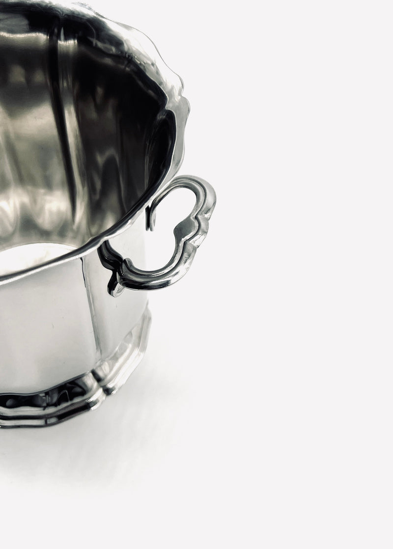 Elegant handle detail of vintage stainless steel ice bucket