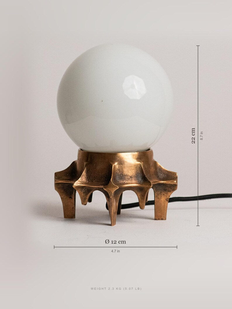 Brutalist Table Lamp, Tripod Cast Metal Base, Opaline Glass Globe Shade, 1970s — in context