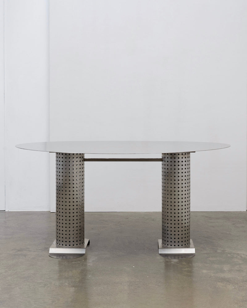 Postmodern Stainless Steel Dining Table, c.1980 — front view with perforated metal legs