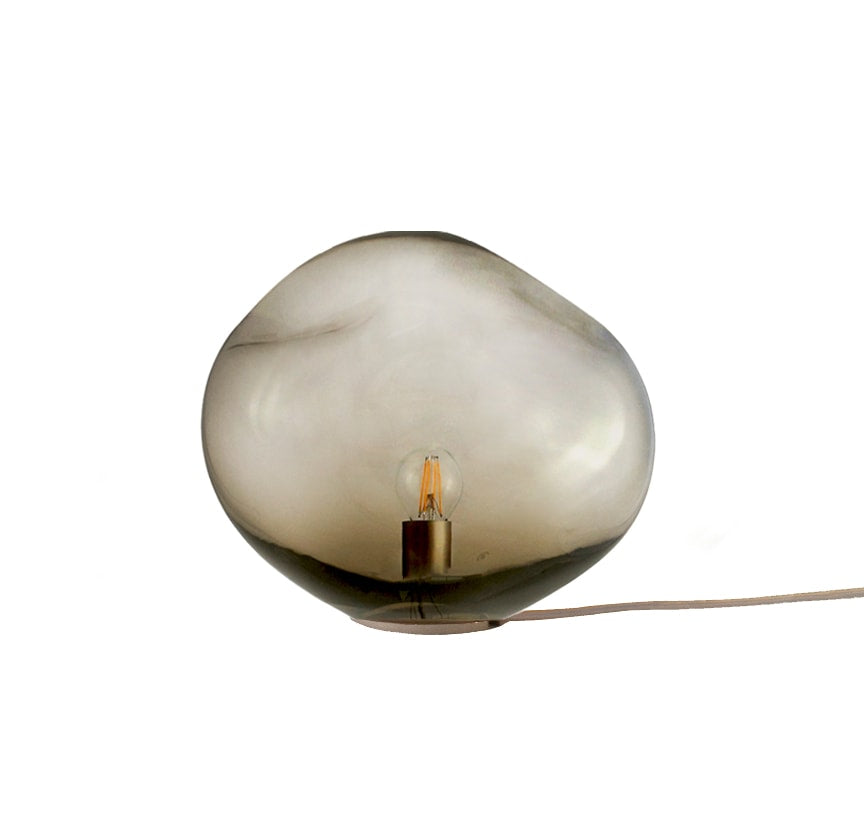 HAUMEA AMORPH table lamp - size S (L: 26cm) — close-up of smoky glass texture