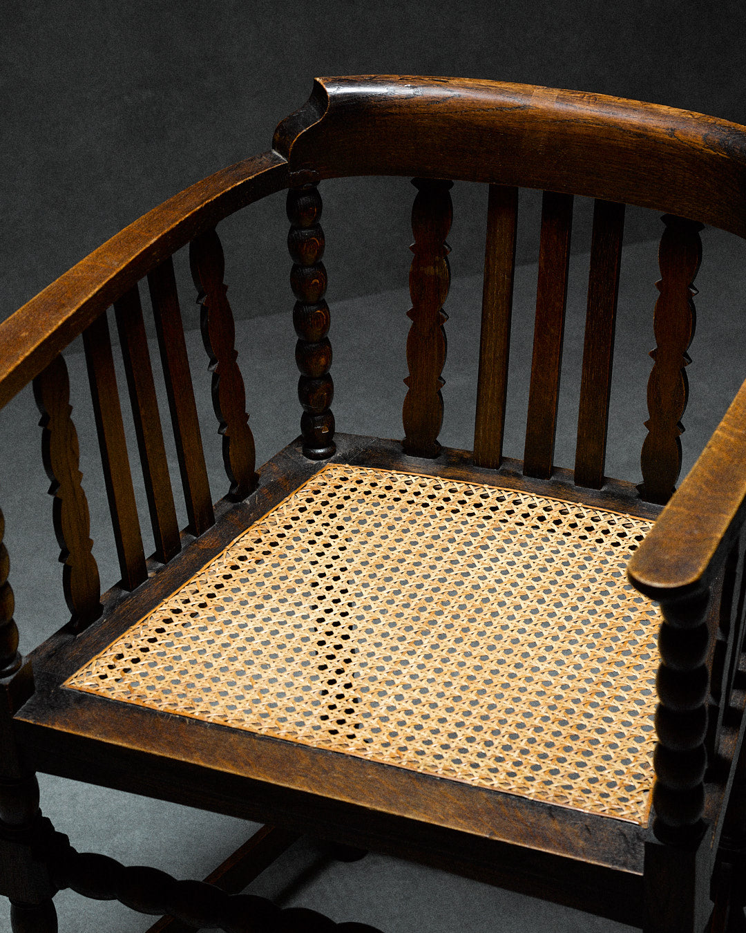 Captains Chair with Cane Seating — close-up of cane seat and wooden frame