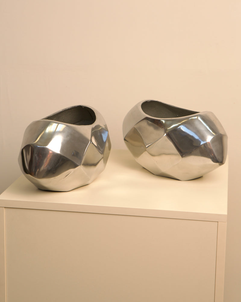 Pair of Italian aluminum Capsule vases with faceted design, 1980s