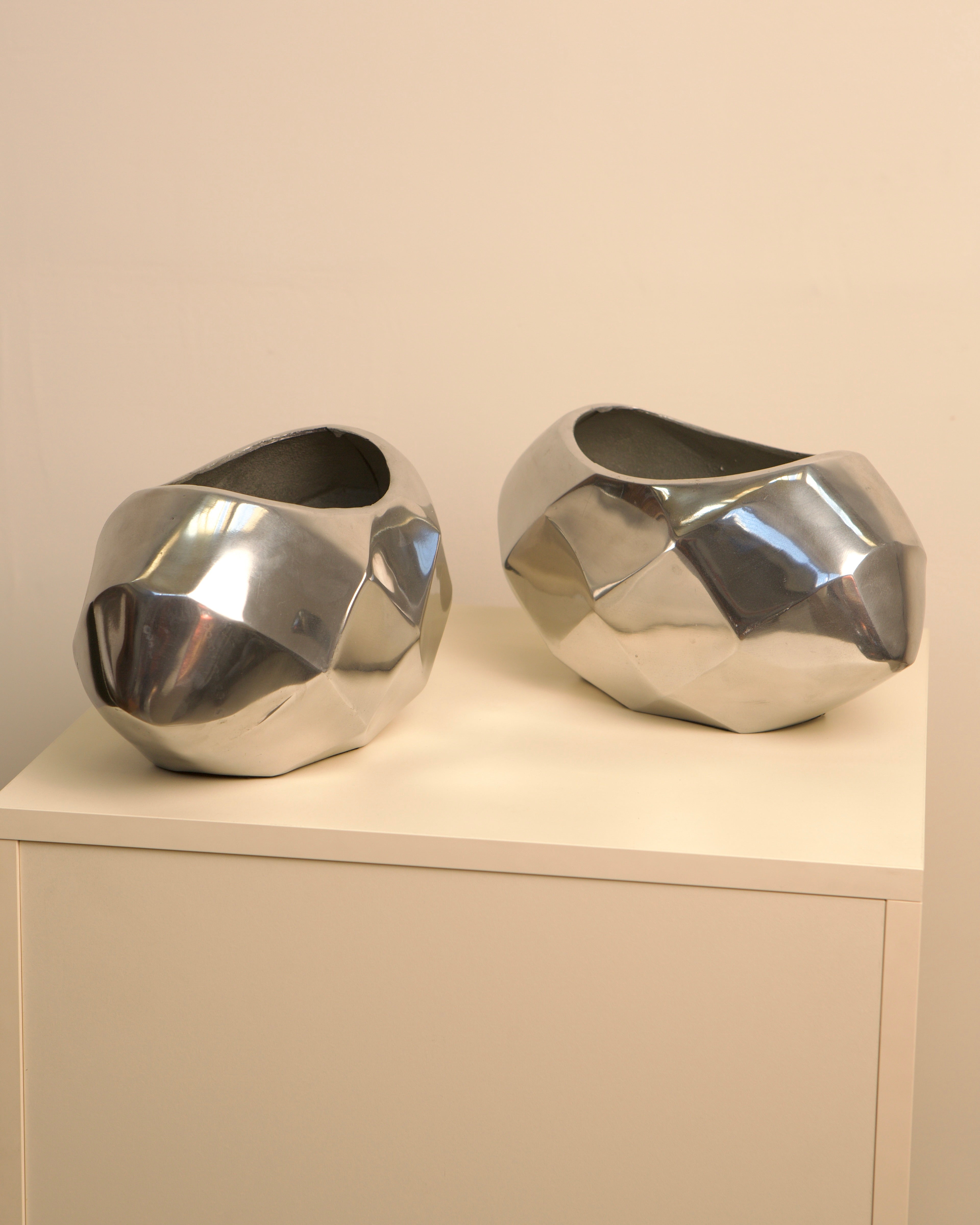 Pair of Italian aluminum Capsule vases with faceted design, 1980s
