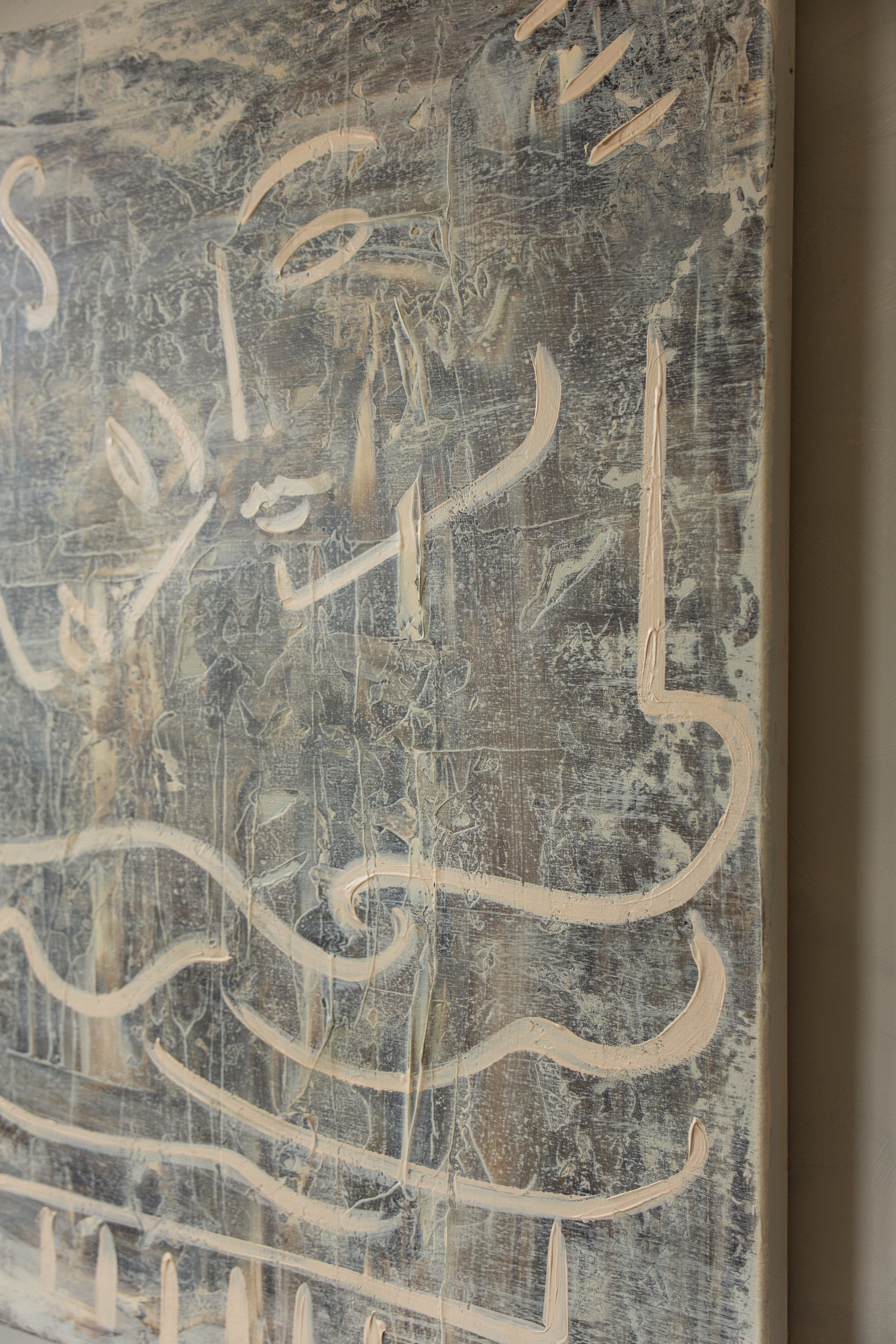 Le Big Hug — close-up of textured canvas with neutral tones