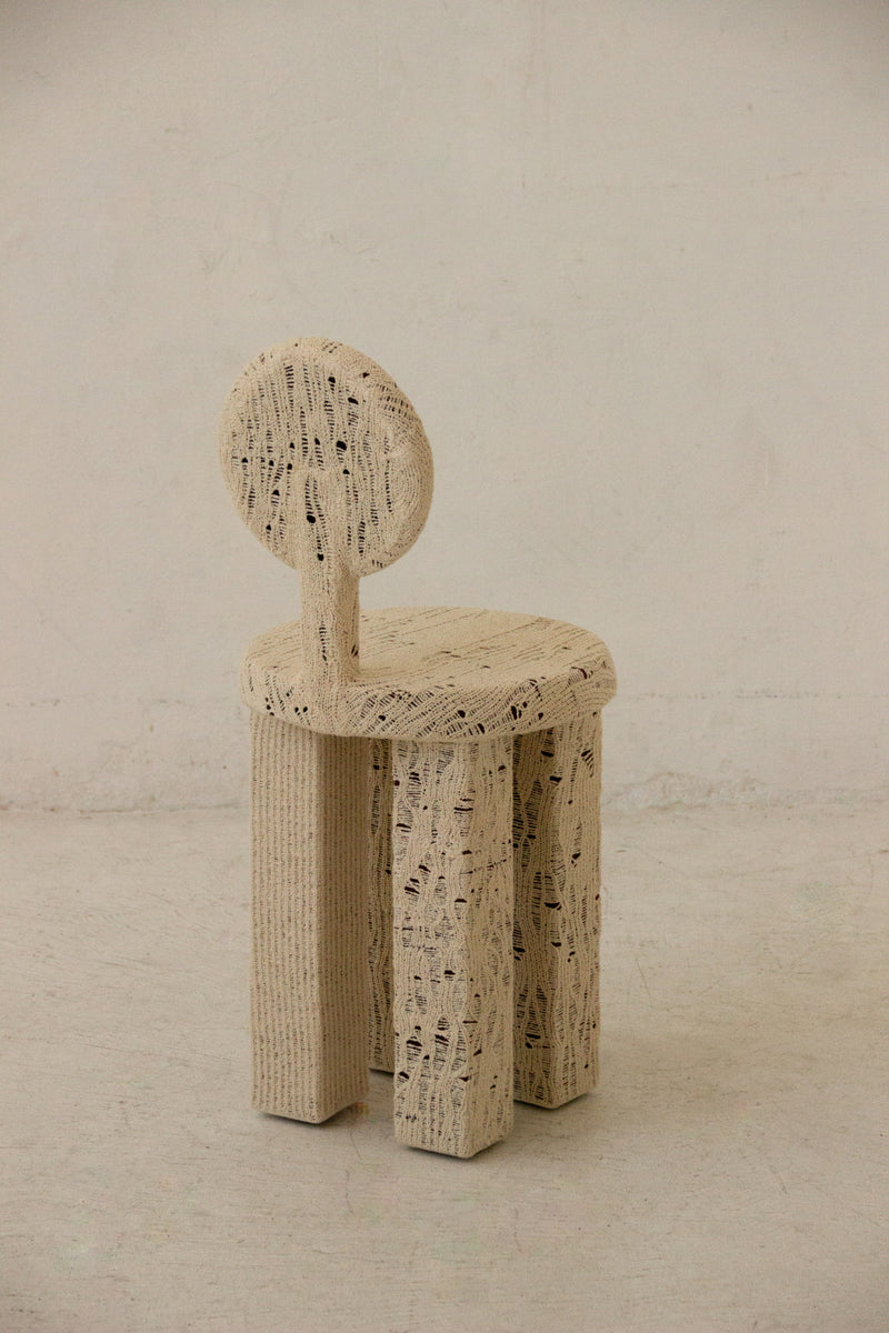 Knitted Chair x '2am Close' — side view of textured beige knitted chair