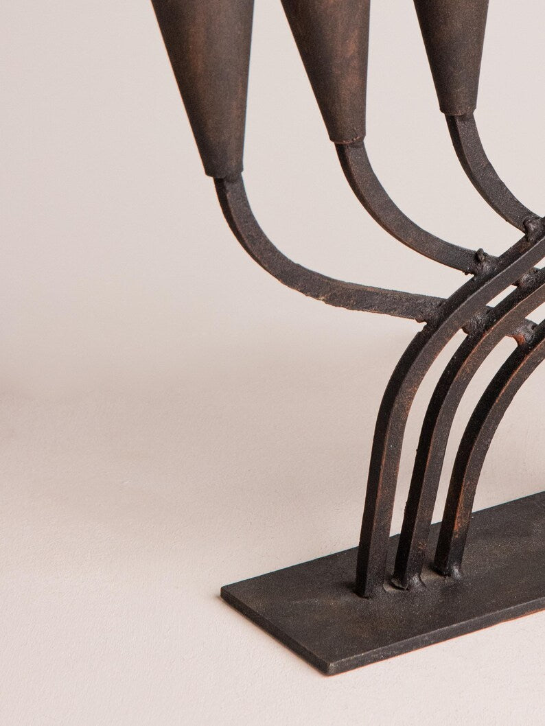 Vintage Cast Iron Candelabra – Mid Century Brutalist — side angle showing curved candle holders