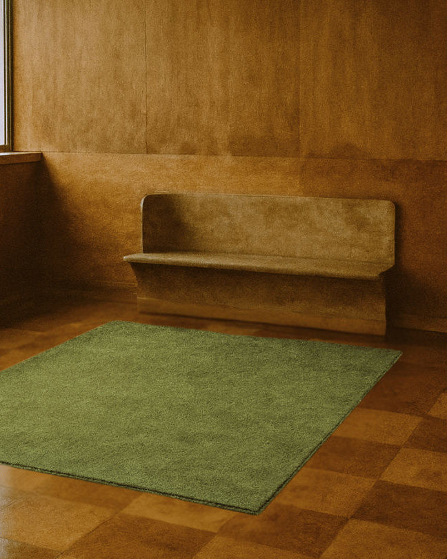 Rug 100% Wool New Zealand - Sauge — close-up of green wool texture in minimalist room