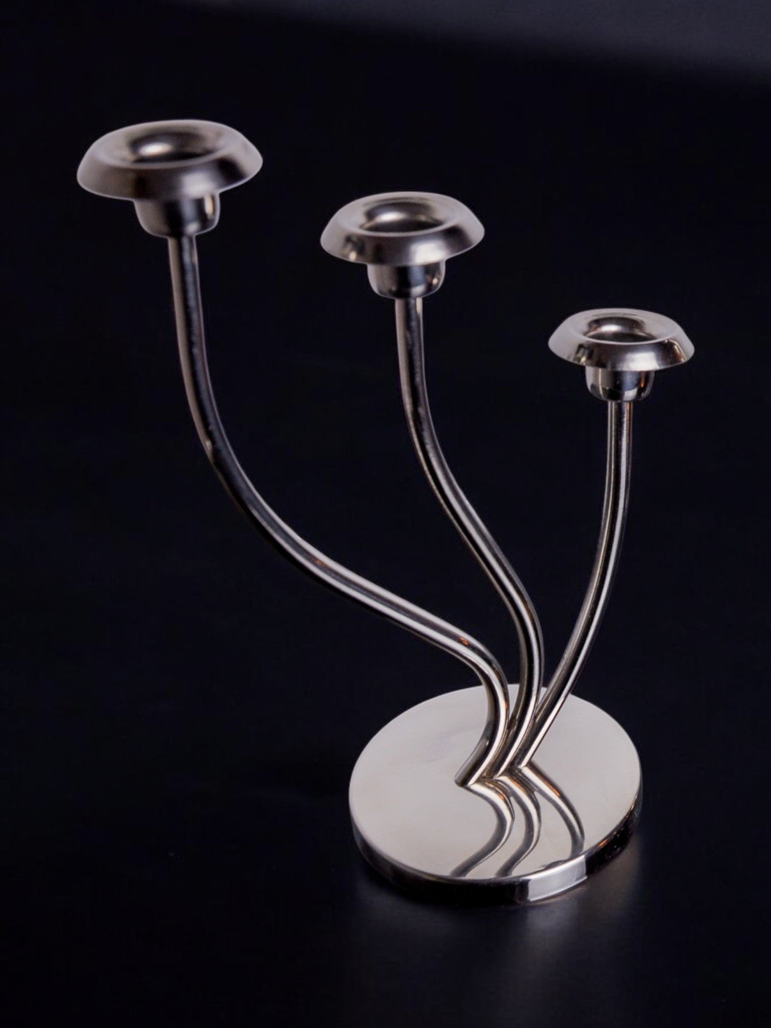 Art deco candlestick in stainless steel 3 flames, Spain, 1970 — lifestyle setting