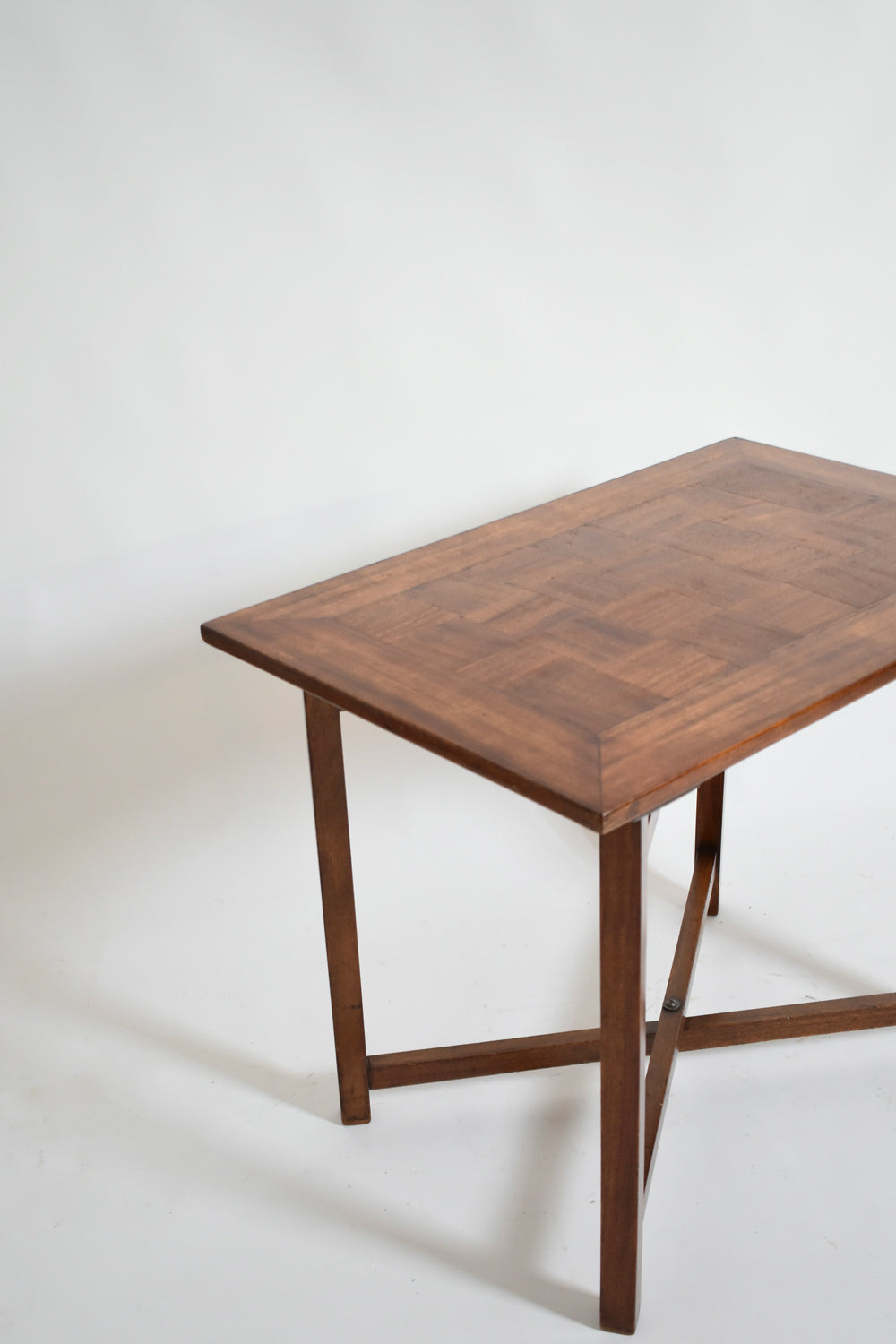 X Shaped Foot Chessboard Table, XIXth c. — angled view of wooden tabletop
