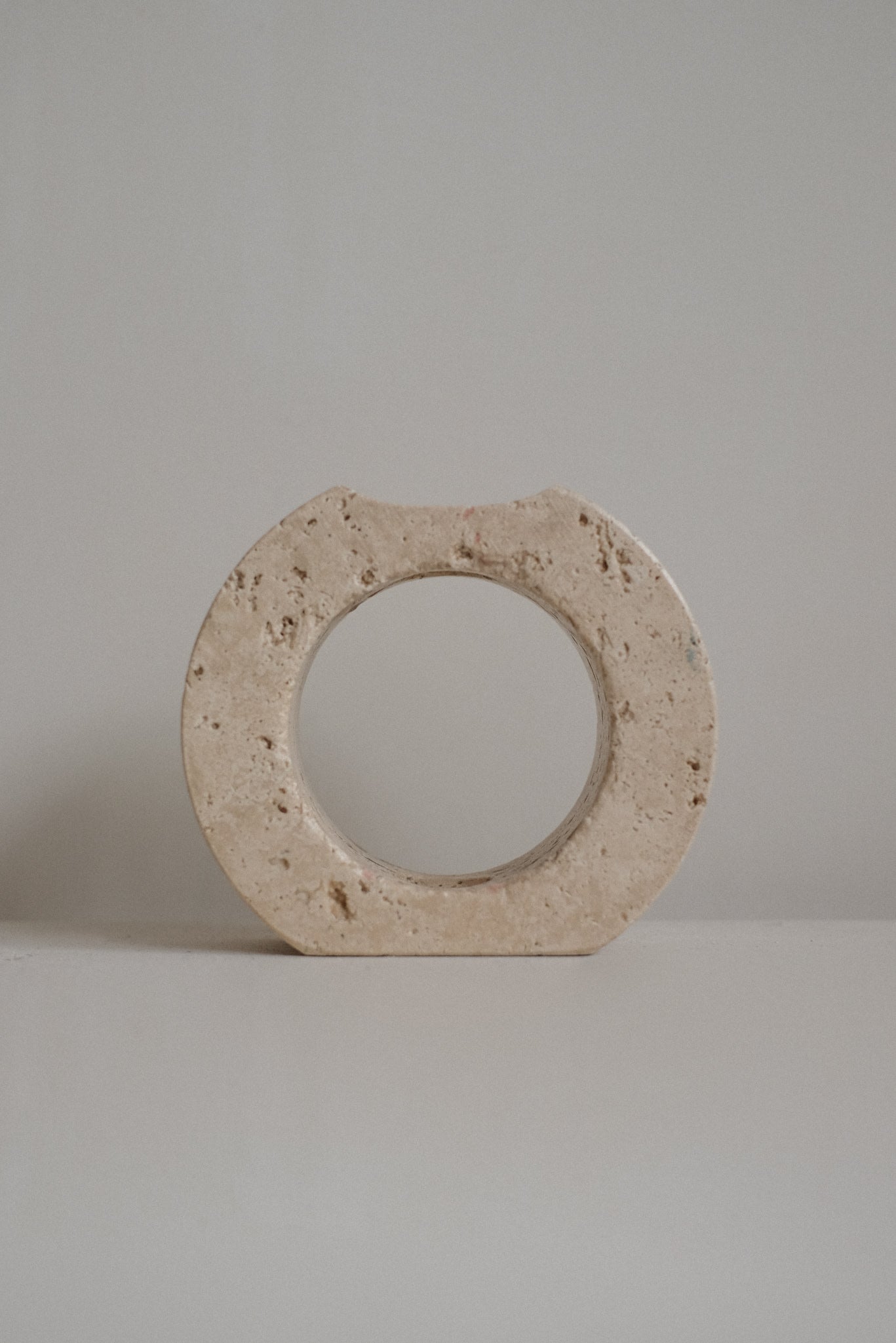 Travertine Candle Holder — side view highlighting natural stone texture