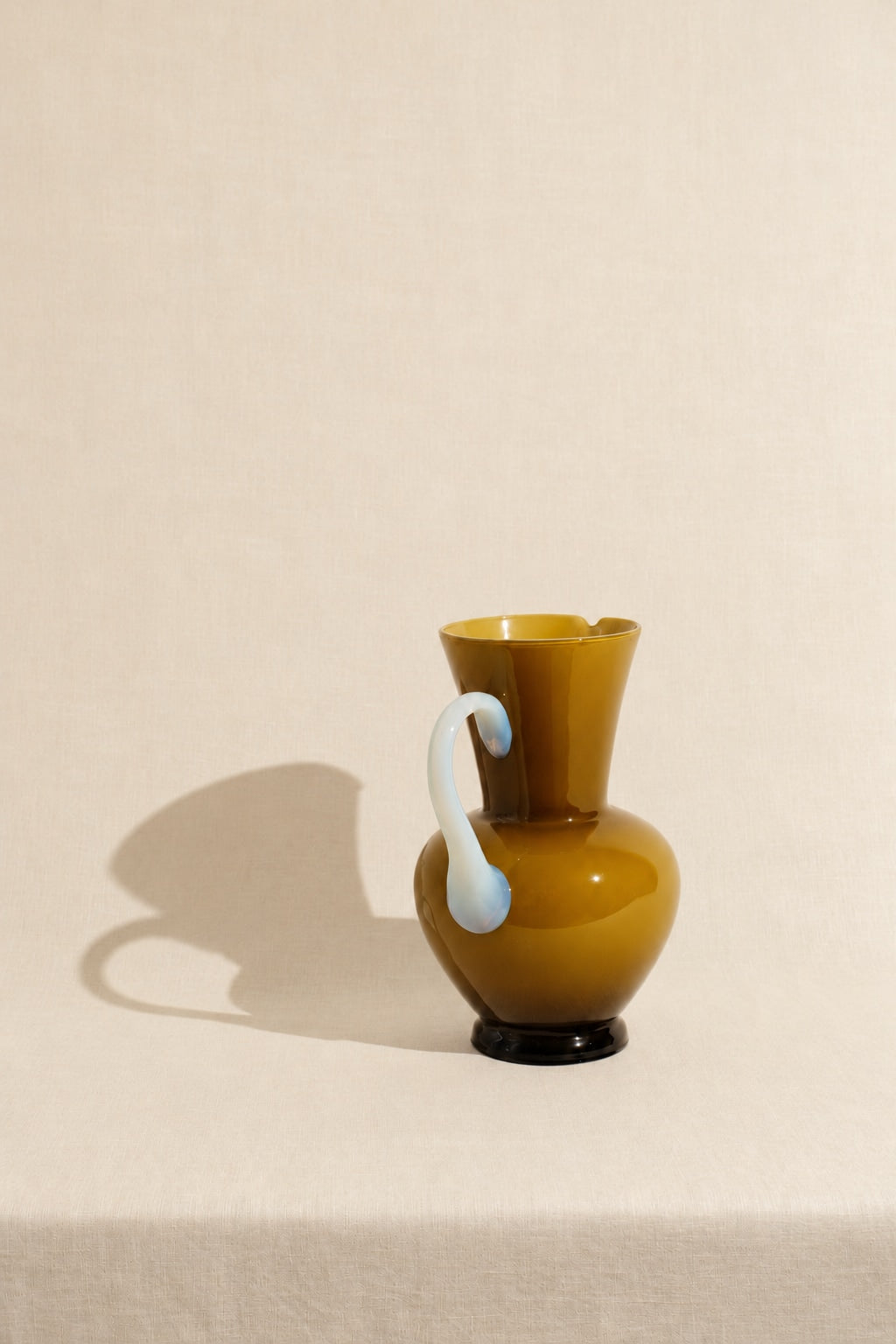 Vintage Amber Glass Pitcher with Opaline Handle — side angle