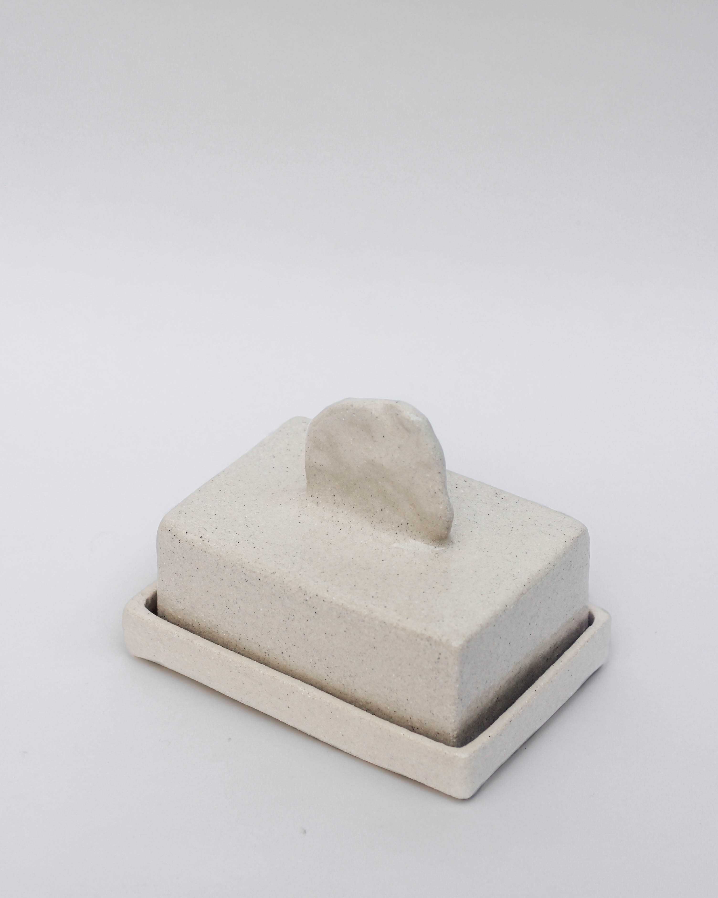Stoneware butterdish — close-up