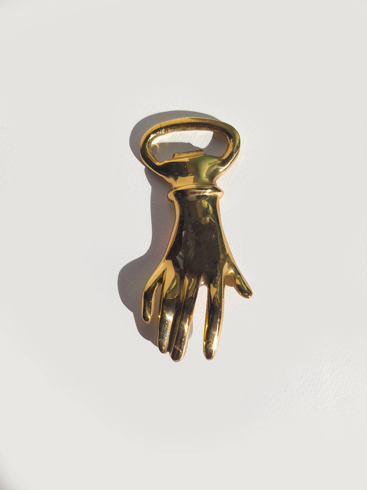 Brass Hand Bottle Opener — detail view