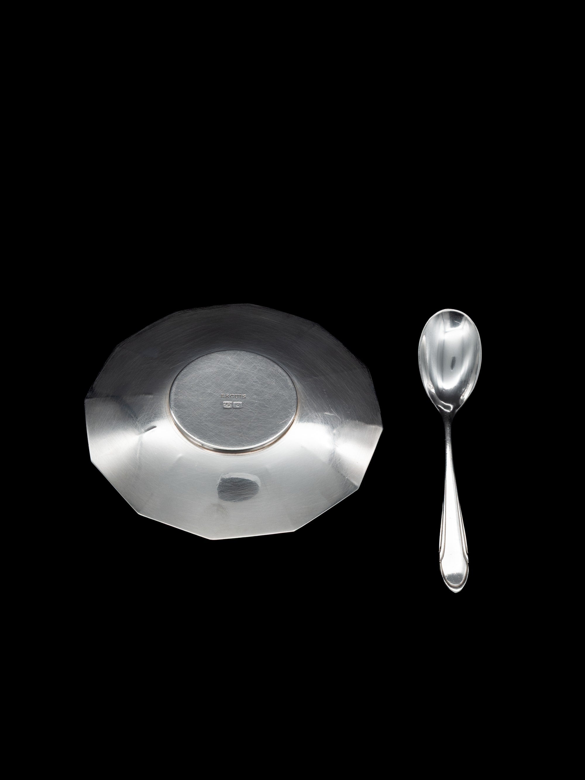 Art Deco Egg Cup & Spoon by Ercuis, France, c. 1930s — top view of polished silver surface