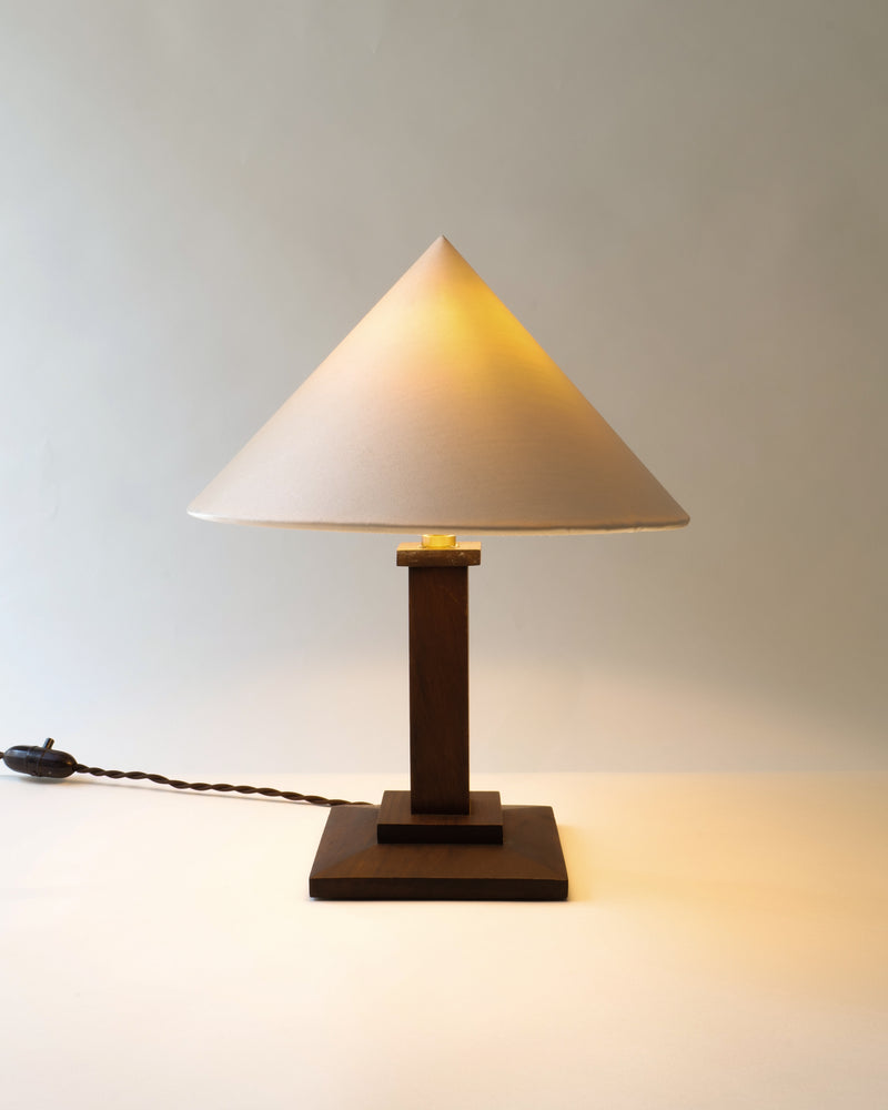 Illuminated 1940s wood table lamp with conical shade detail