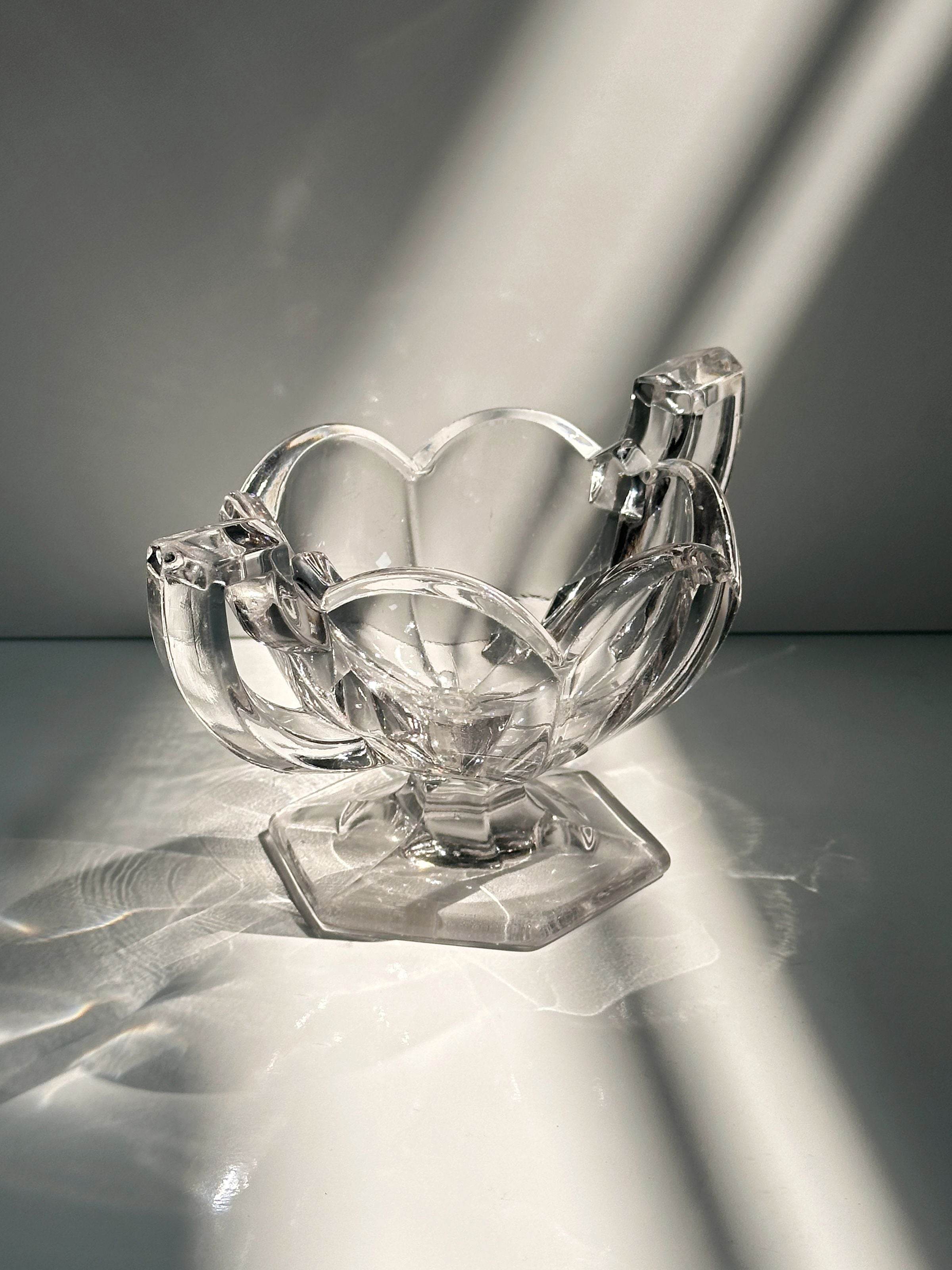 Crystal Glass Bowl — side angle showing clear glass design with light reflections