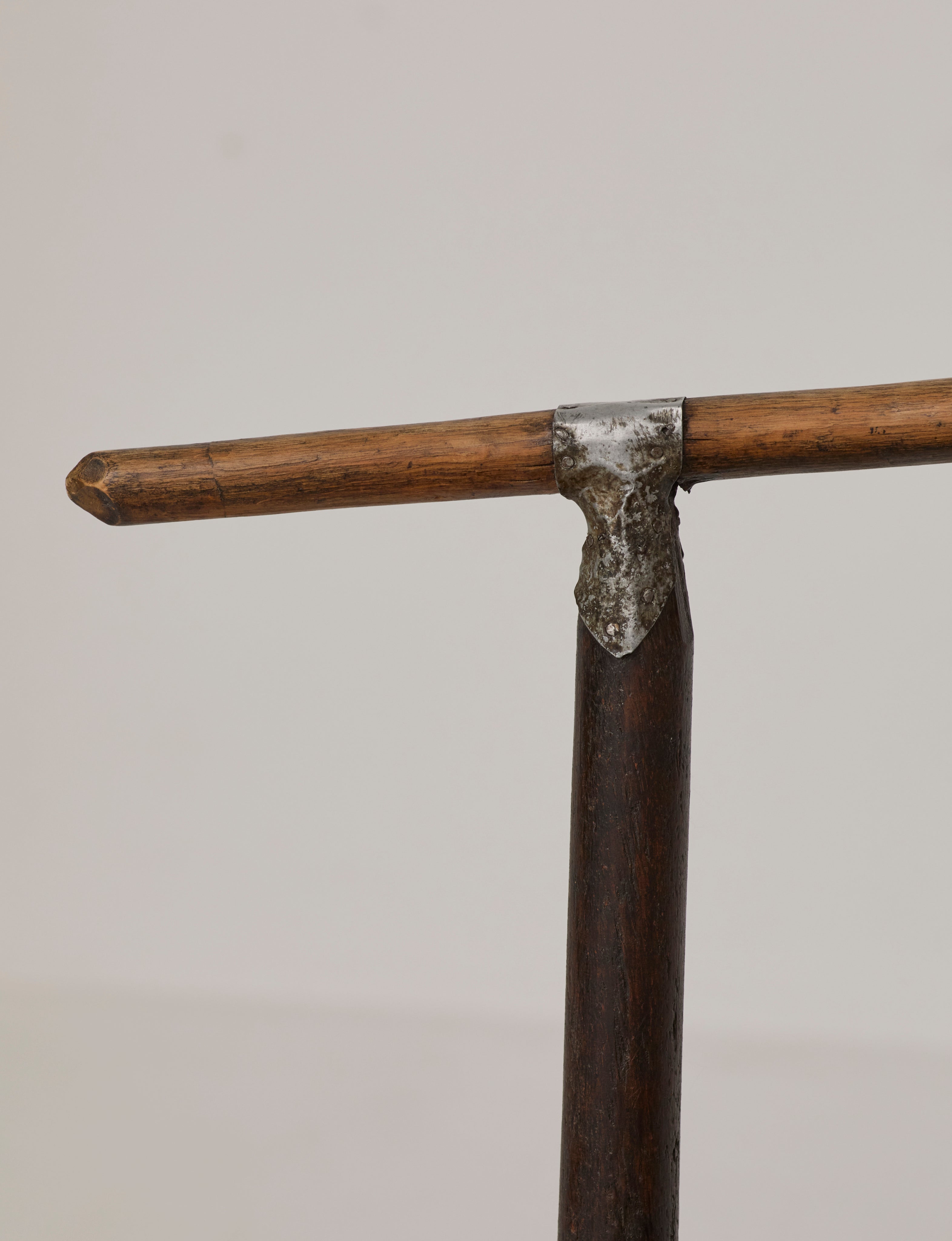 Small artisanal vintage West African chair "Baoulé" in solid wood C. 1960 — in context