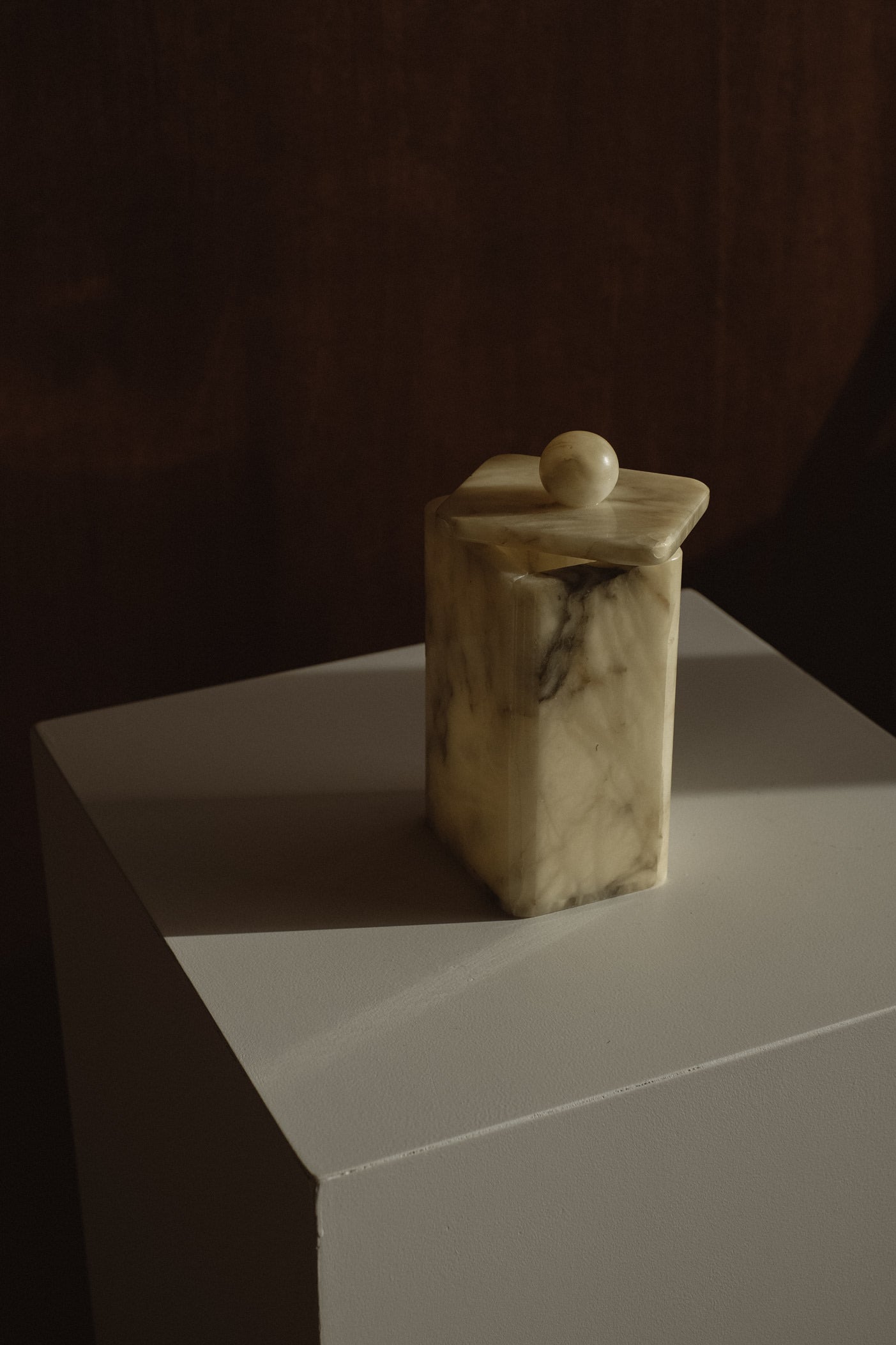 Vintage Onyx Jar — back view on white pedestal with soft lighting