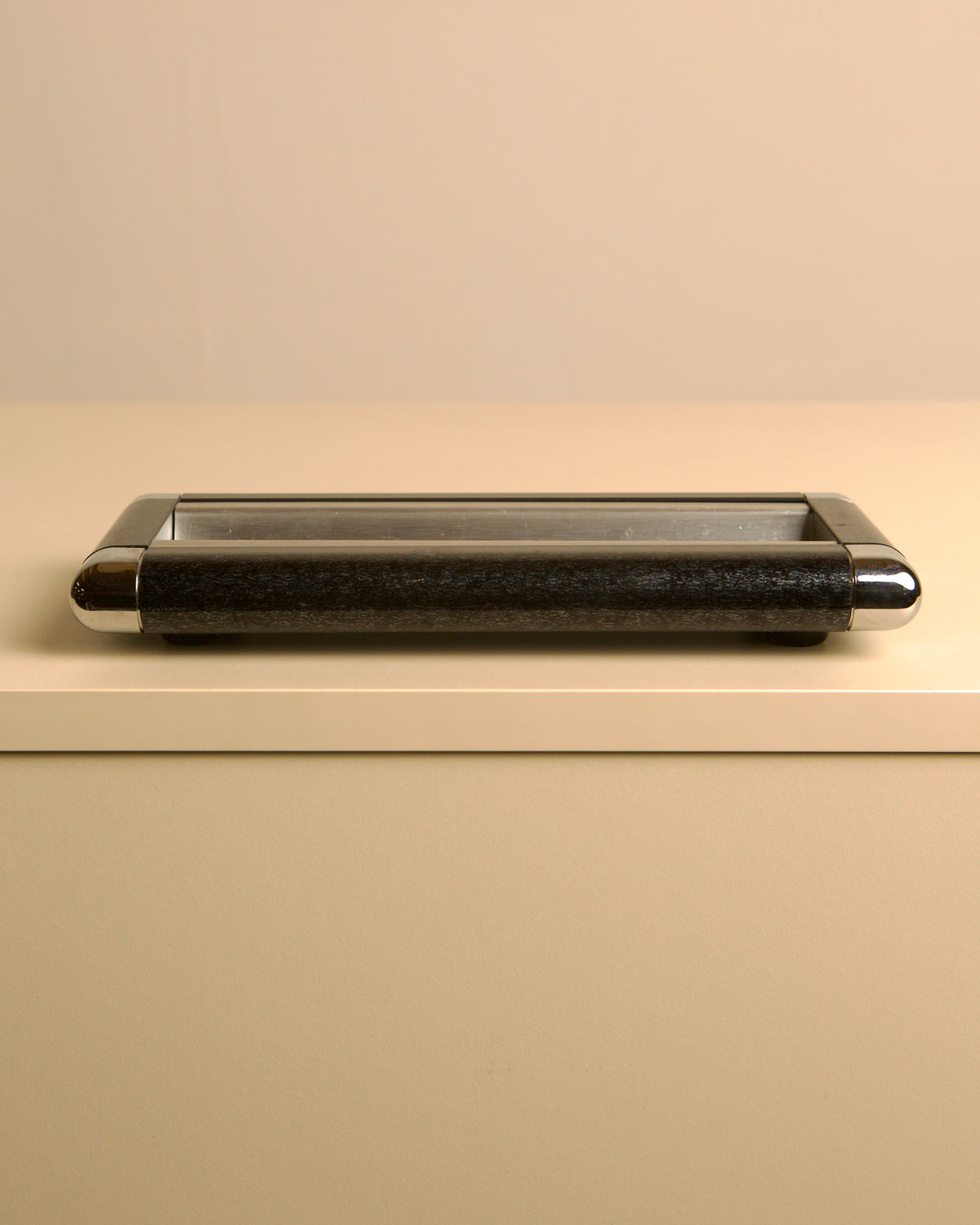 talian rectangular Bakelite and metal catch-all, 1970s — detail view