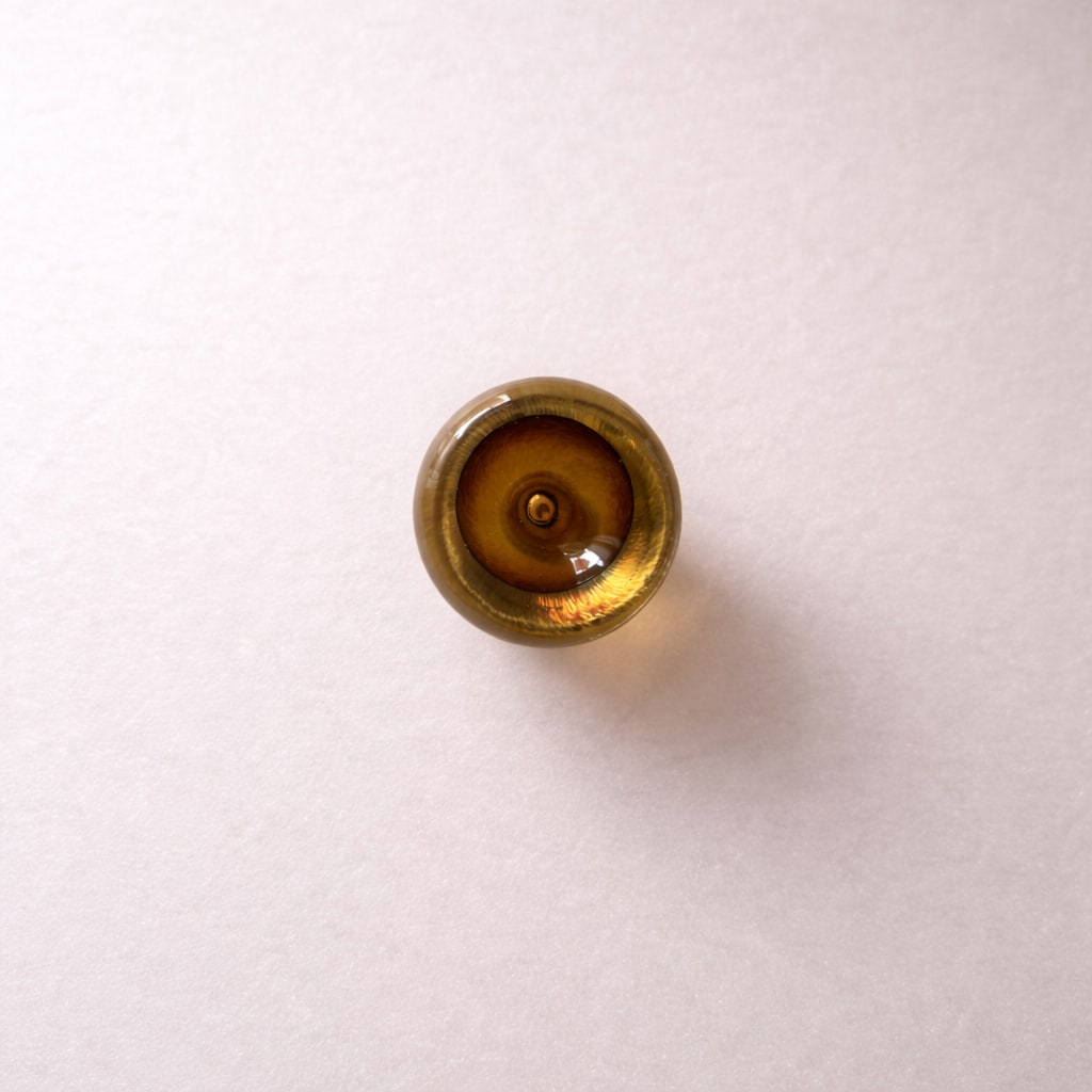 Knob Collection Sculptures in Glass — top view of amber glass sculpture