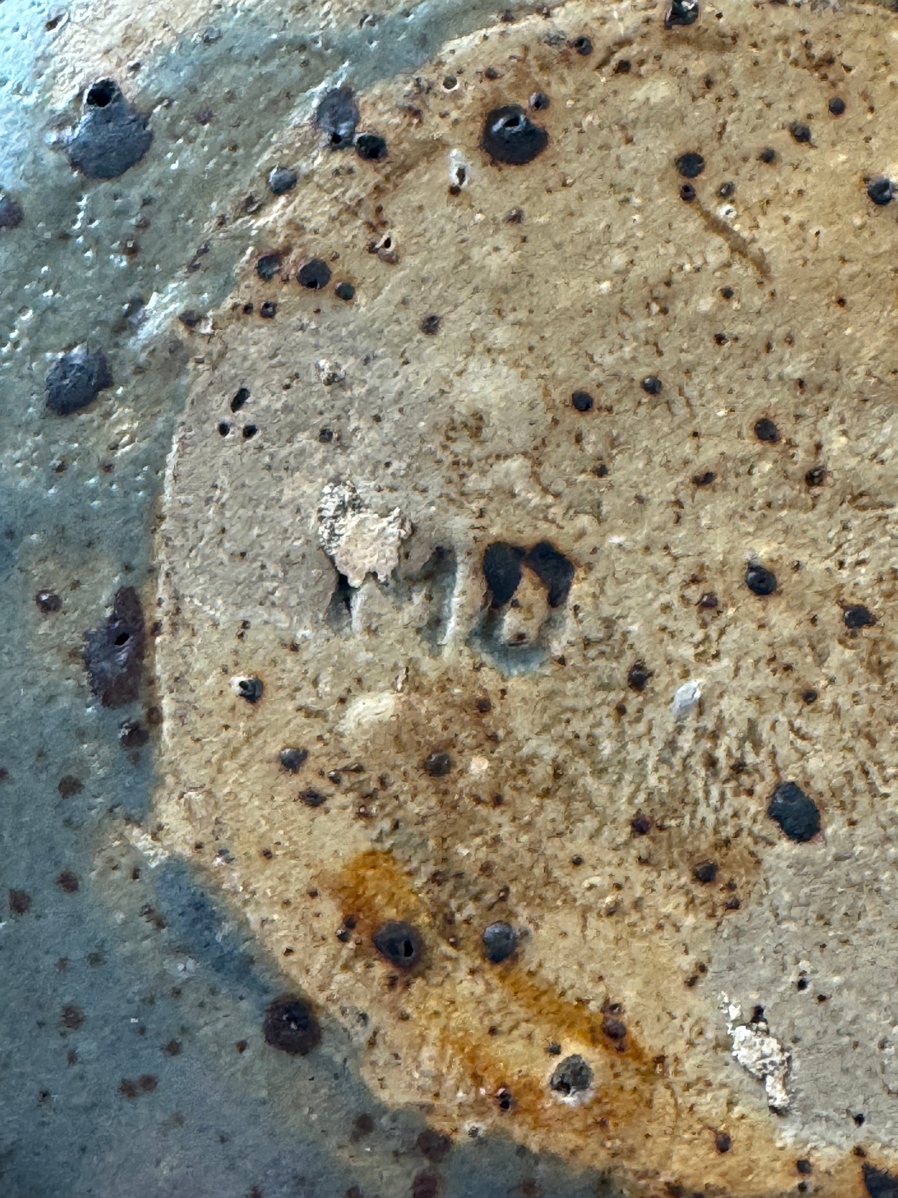 Textured surface detail of 1960s French stoneware flower frog vase