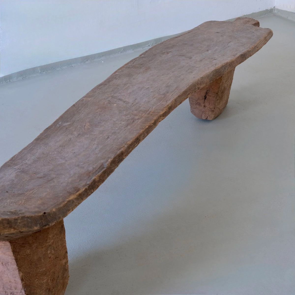 Primitive African Carved Wood Low Sculptural Bench | Vintage — close-up