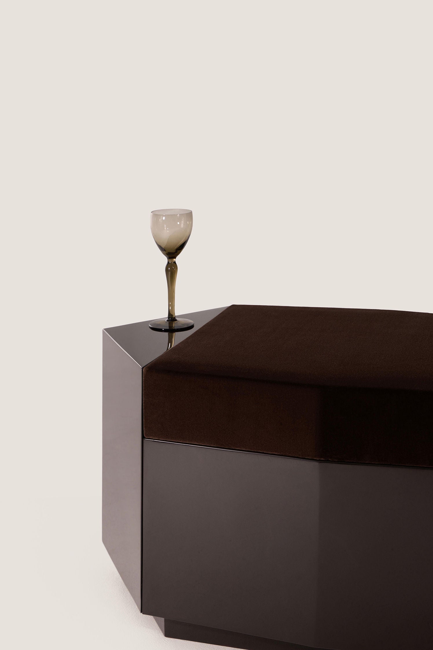 Ame I' Lacquer Ottoman — back view with dark lacquer finish and velvet top