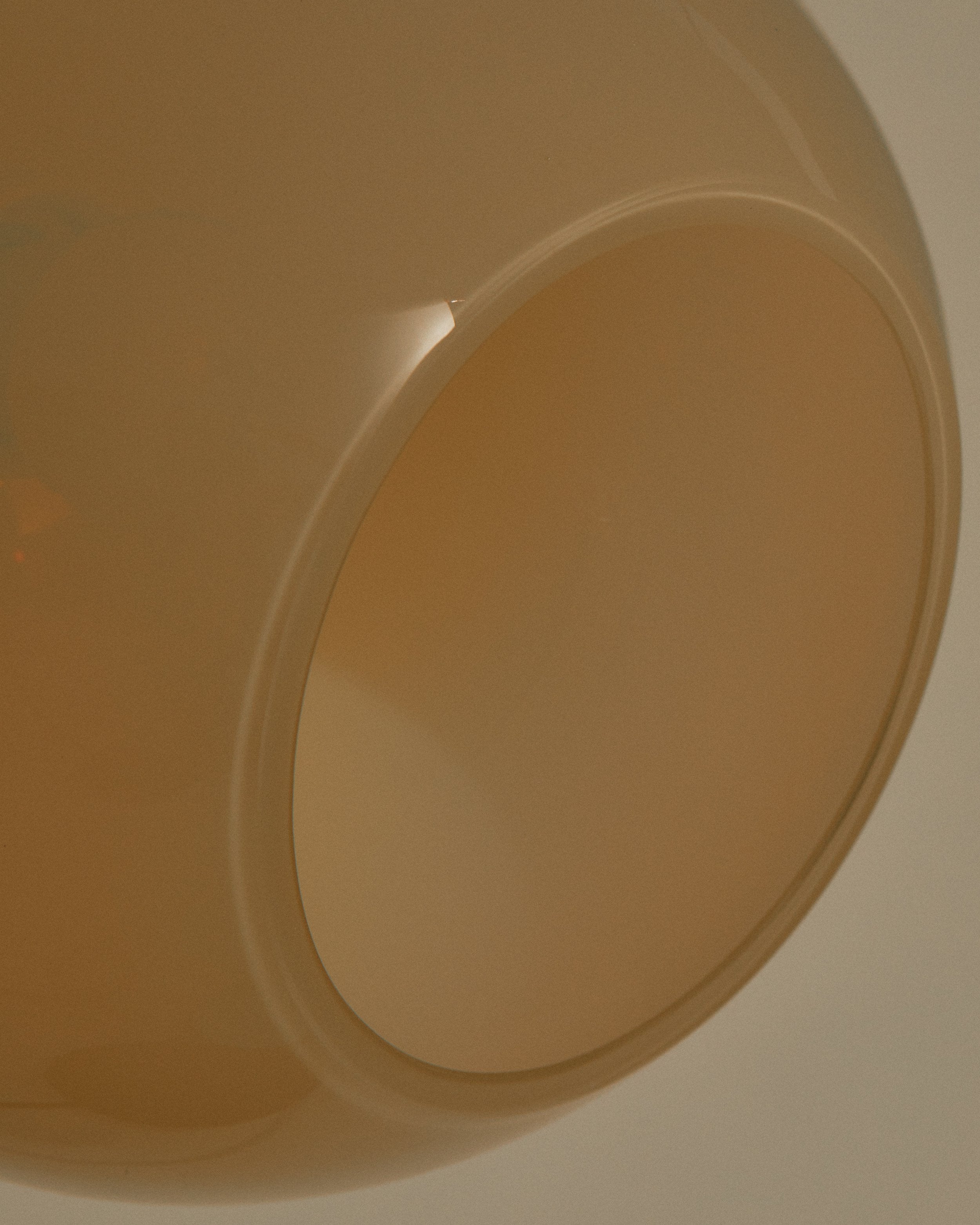 Oro Table Lamp w/ Handblown Glass — top view of amber glass shade
