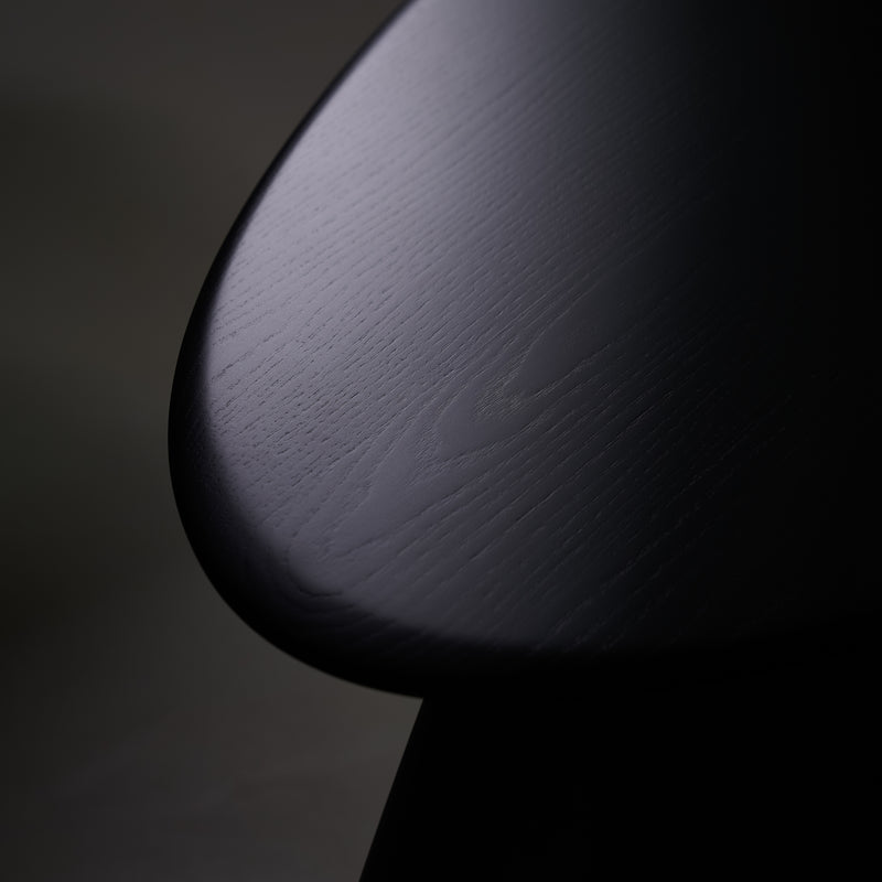 Kies' Coffee Table — close-up of dark wood surface texture