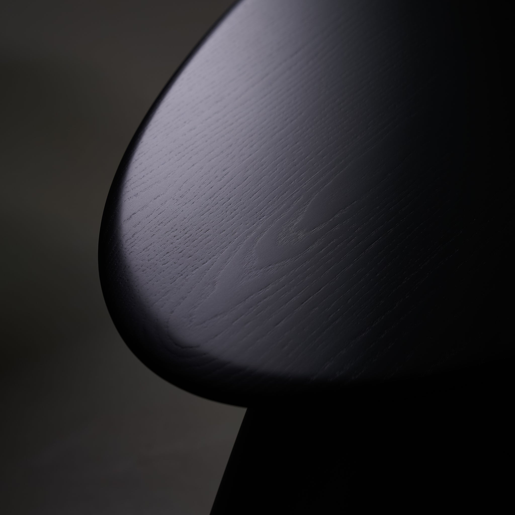 Kies' Coffee Table — close-up of dark wood surface texture