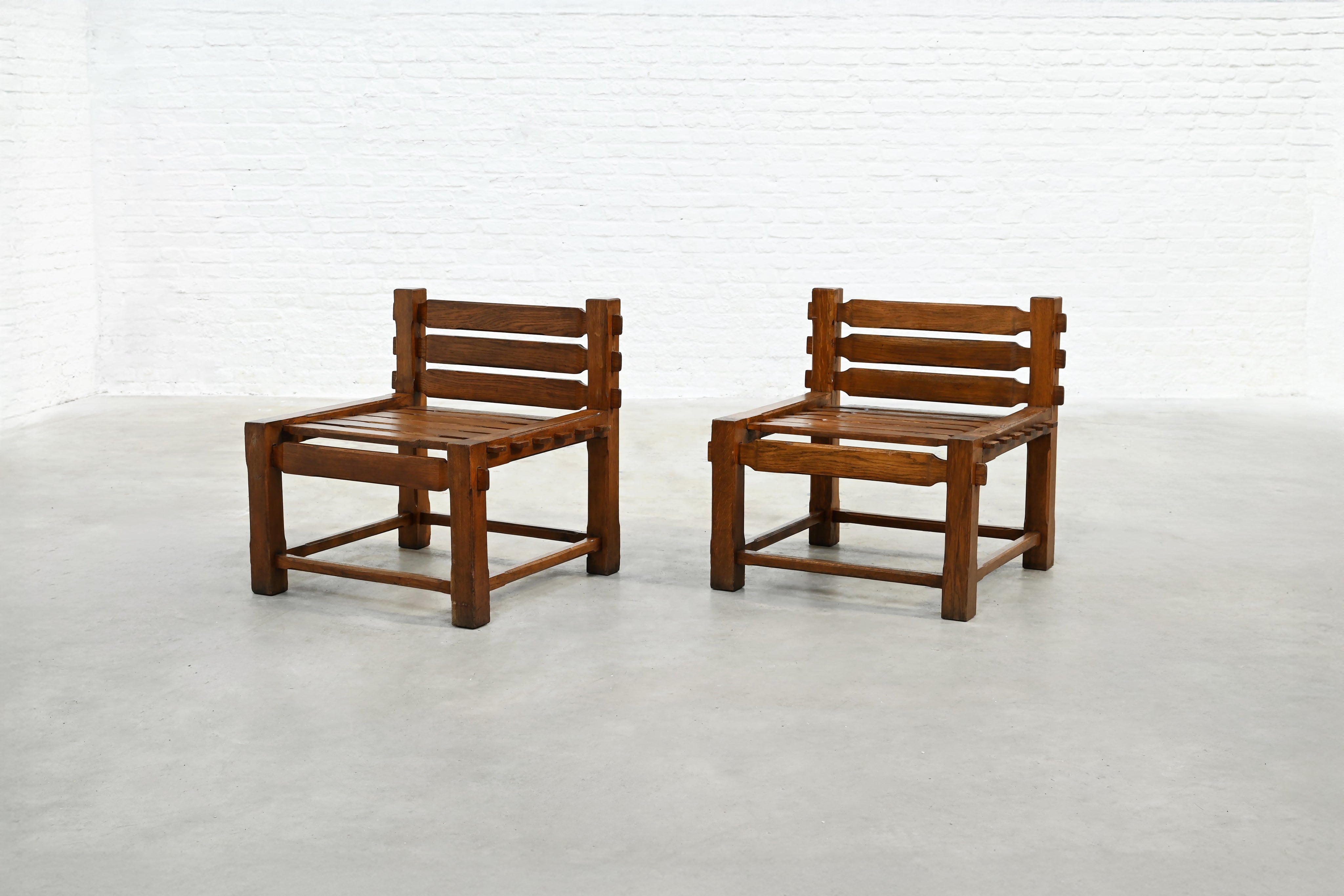 Pair of 1970s brutalist oak chairs front view detail