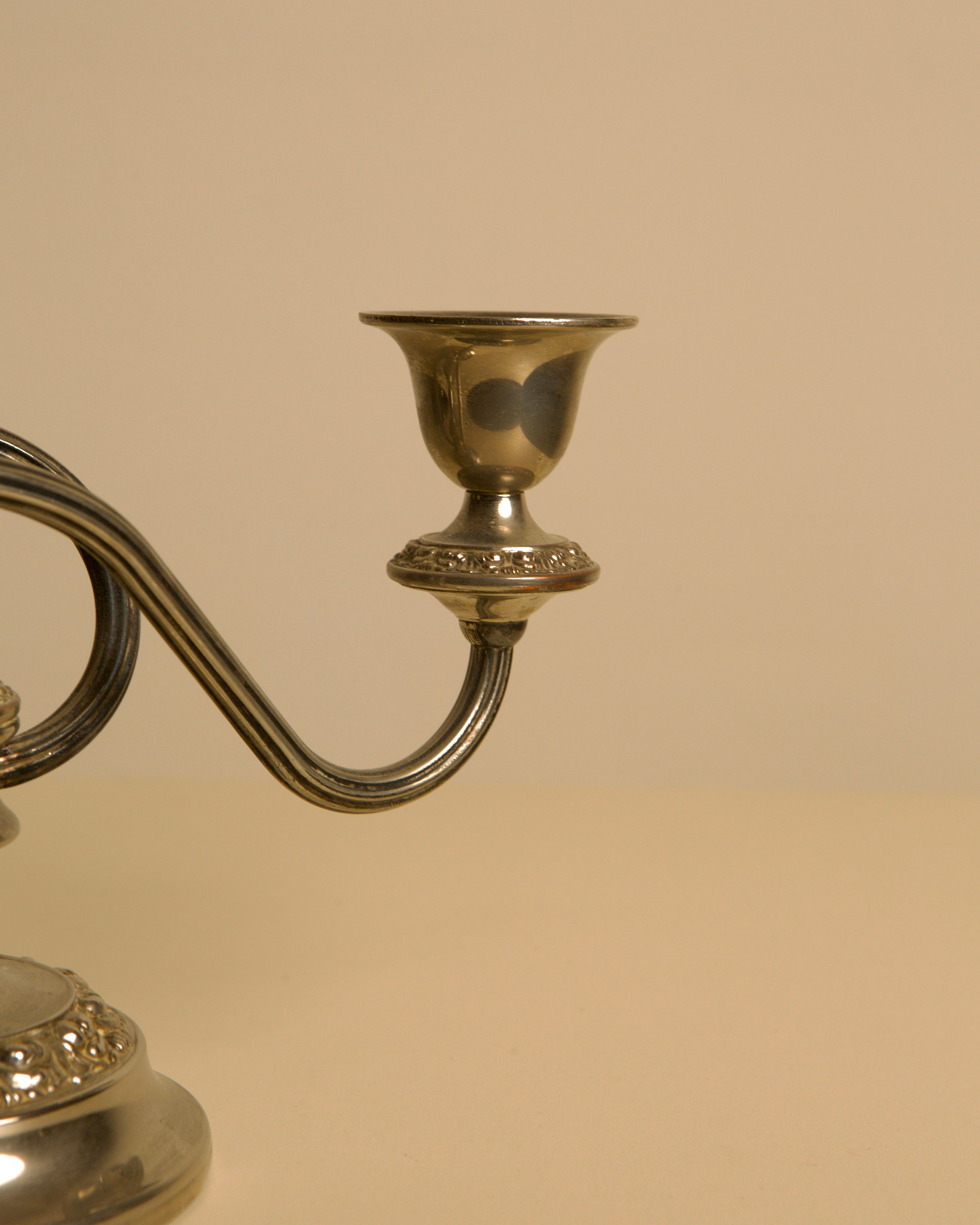 Italian Art Deco Metal Candleholders, 1930s — side angle showing polished metal finish