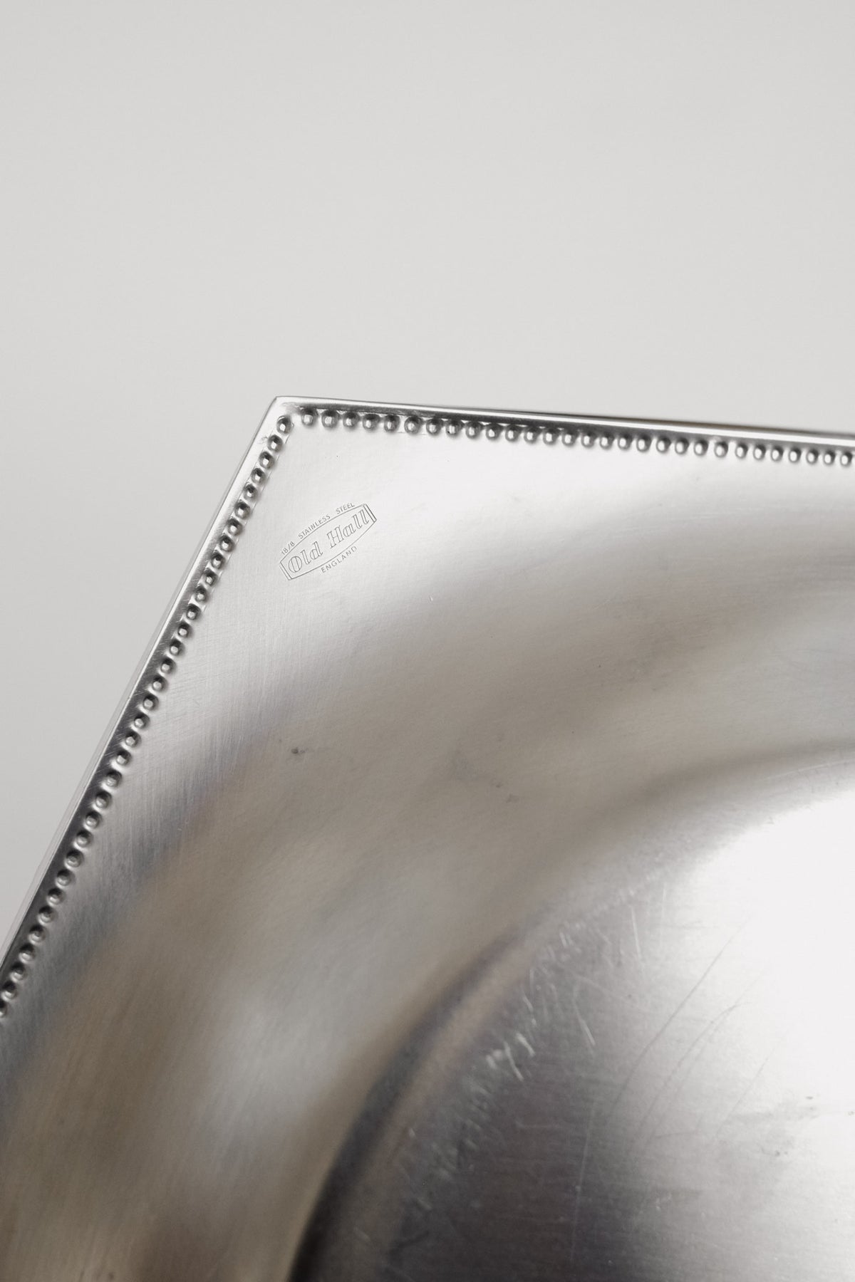 Vintage Old Hall Stainless Steel Basket with Beaded Edge — in context