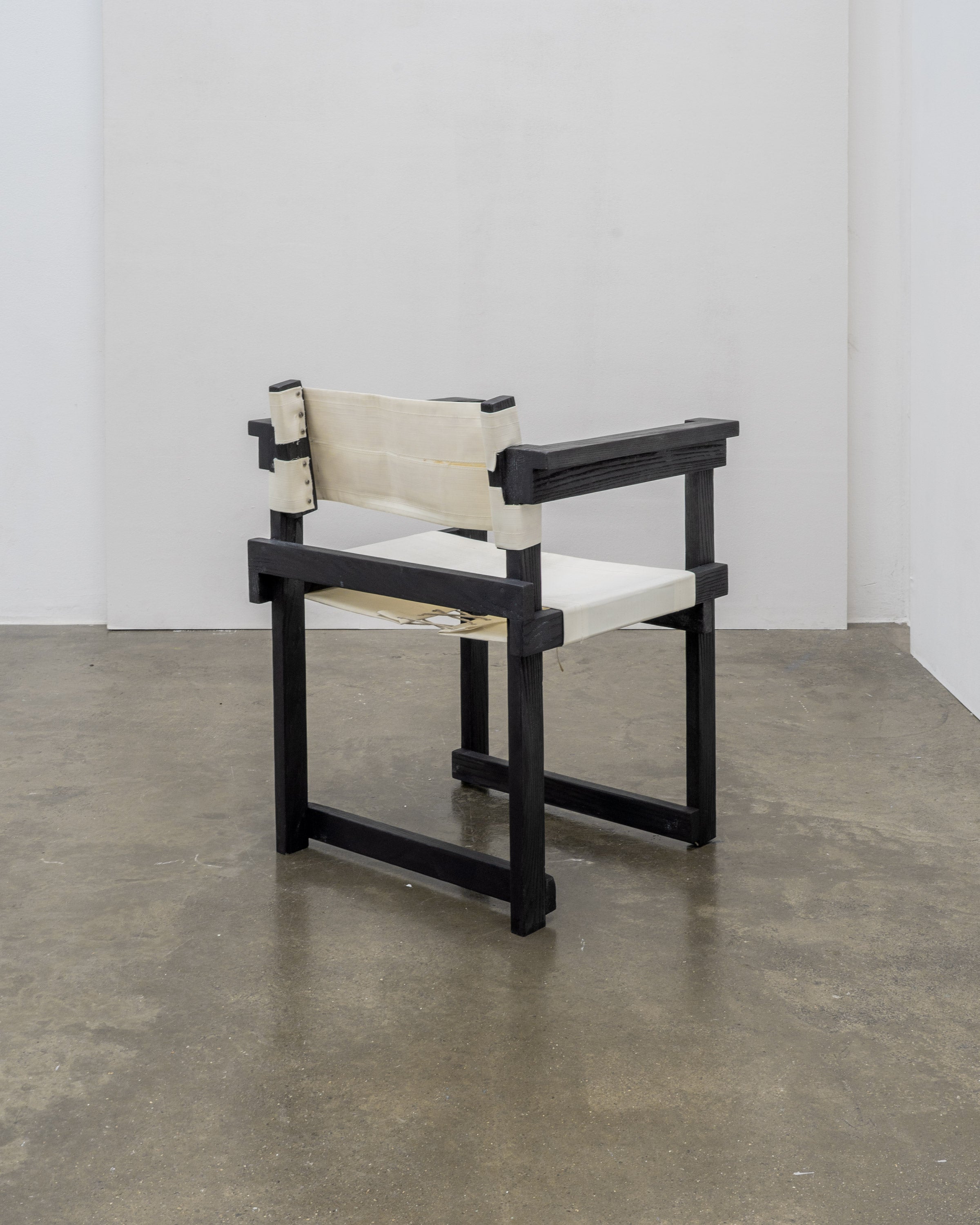 Modernist Dutch Chair after Gerrit Rietveld (1-6) — side angle showing black wood frame and canvas seat