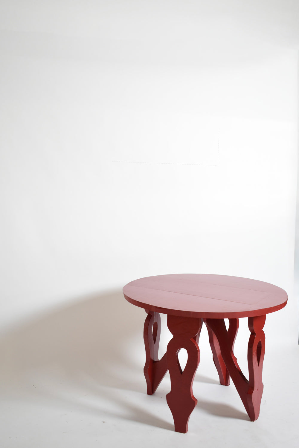 Burgundy Red Rustic Round Table, 1920s — lifestyle setting
