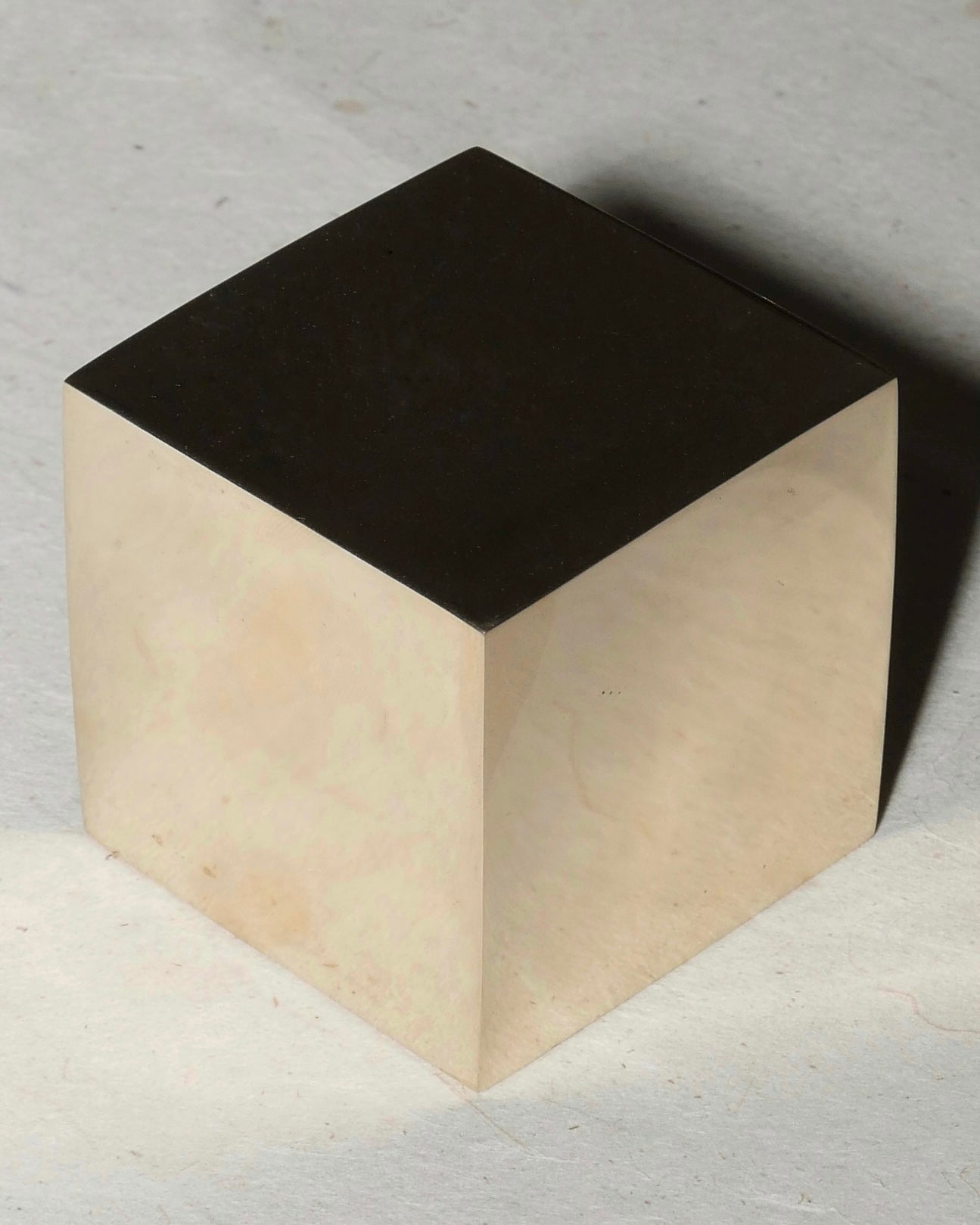 CUBE Cabinet Knob Large — side angle of polished metal surface