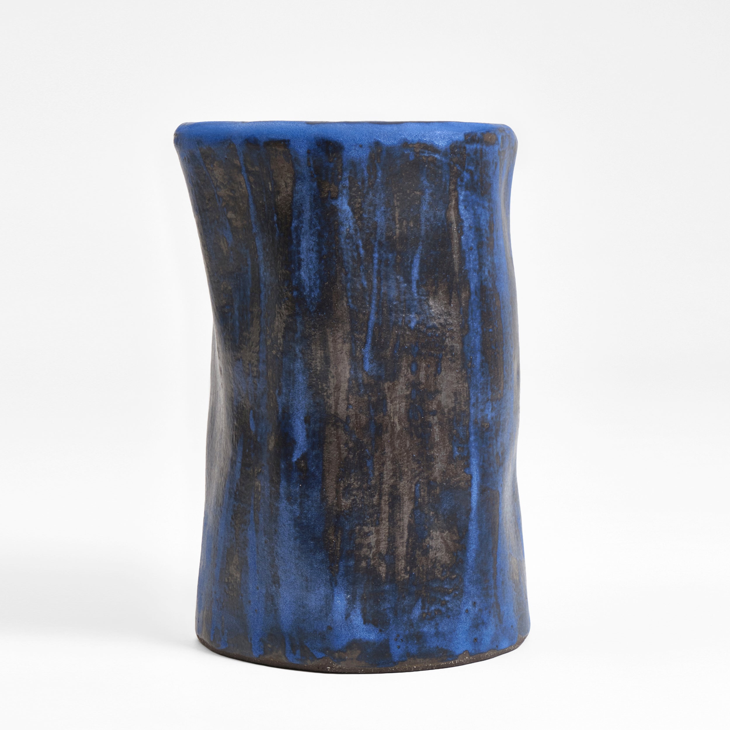 Small Ceramic Side Table — close-up of textured blue ceramic surface
