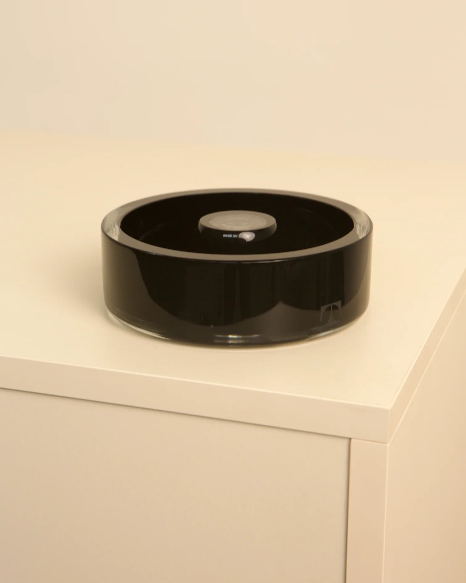 Black Murano glass vide-poche by Venini, detail view on white surface