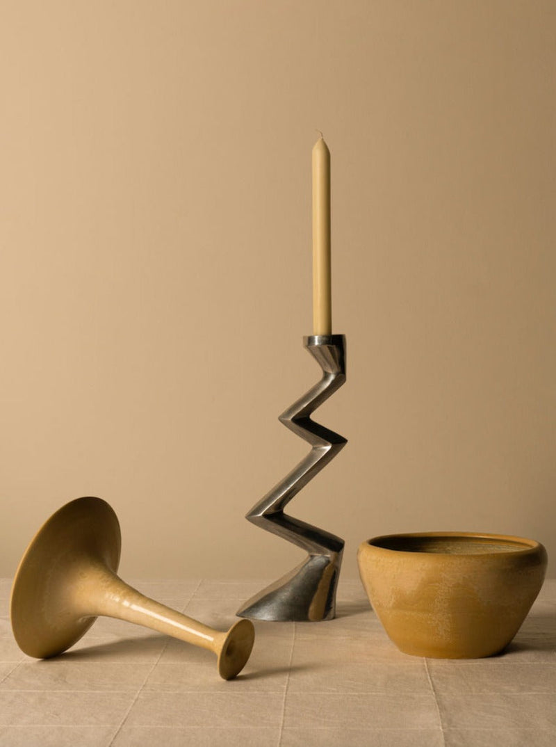 Matthew Hilton zigzag brass candle holder with cream candle