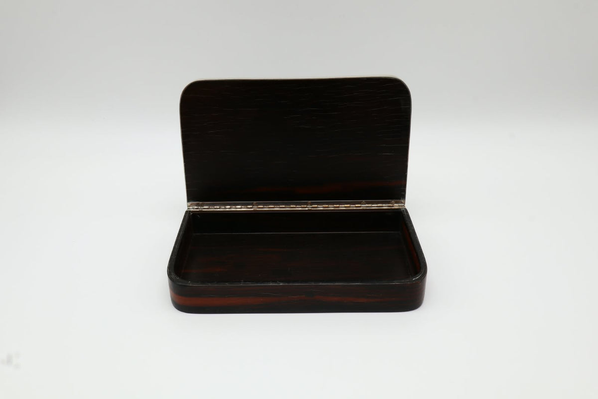 Rare Art Deco Bauhaus Box in Rosewood and Sterling Silver – France, c. 1930 — lifestyle setting