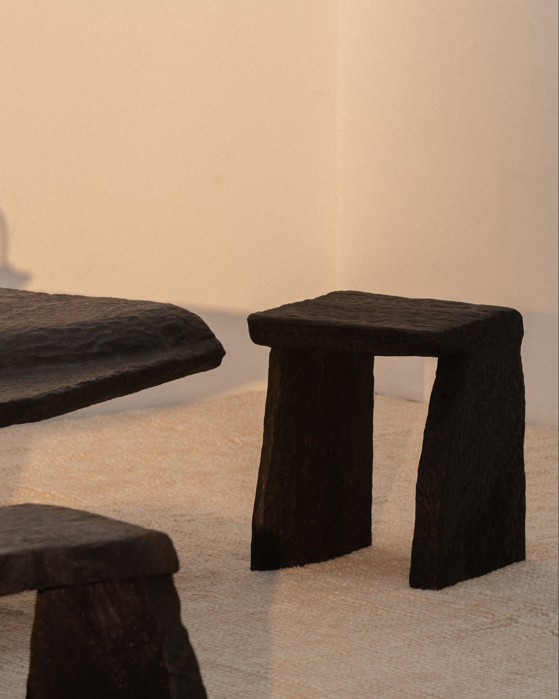 Massif Carved Stool in Eucalyptus Wood — detail view