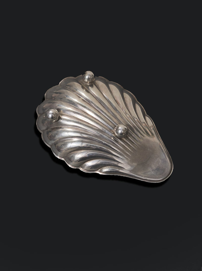 Silver-plated shell vide poche with decorative feet detail view