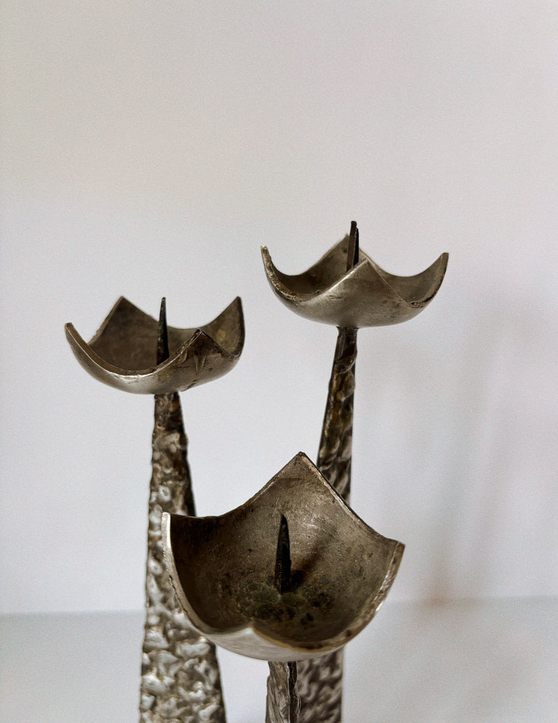 Brutalist Steel 3 Arm Metal Candlestick, Poland Mid Century — close-up of textured steel candle holders