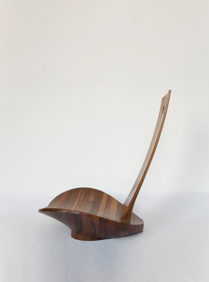 Lotus Armchair — side profile of handcrafted wooden design